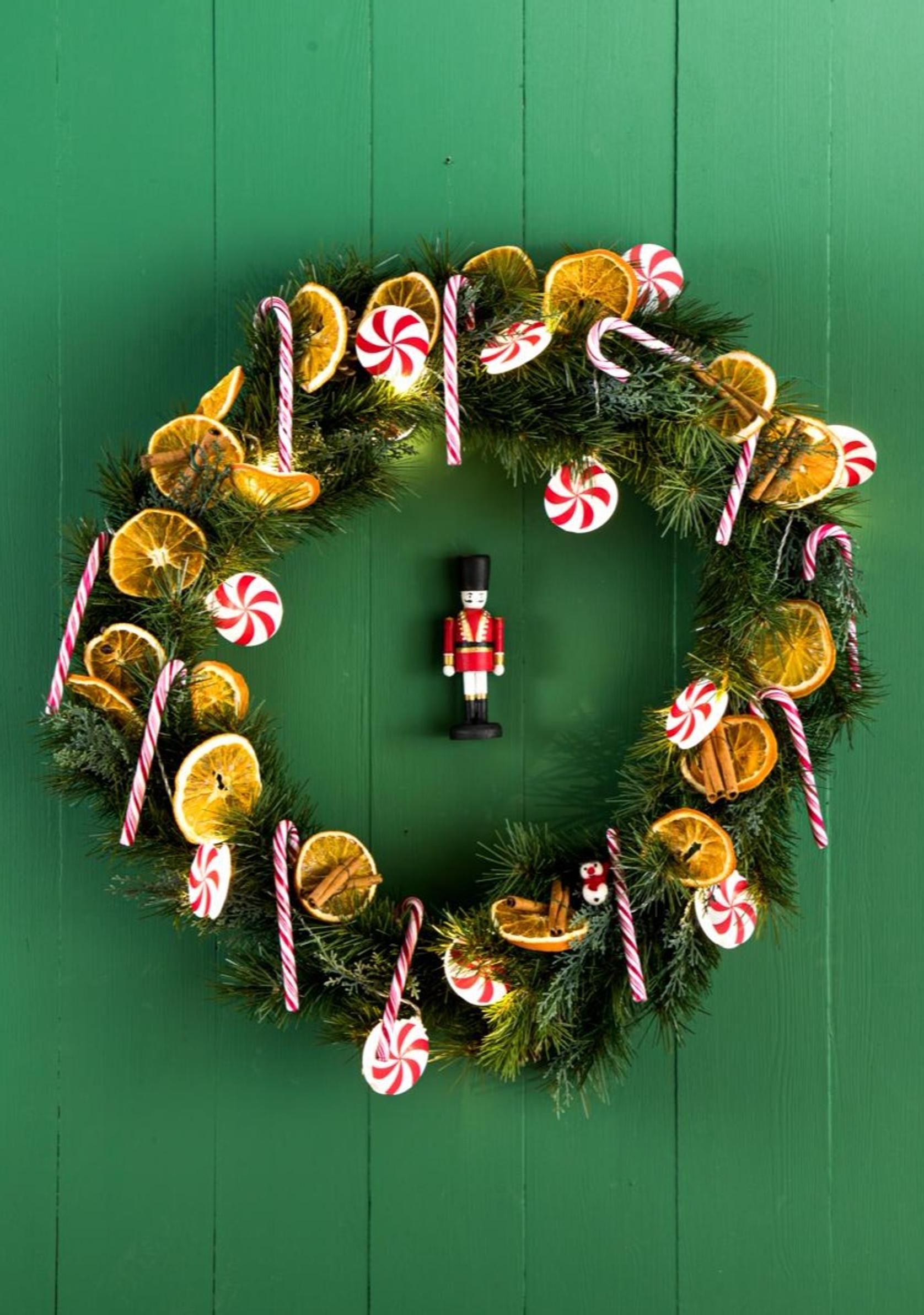 A wreath decorated with dried orange slices