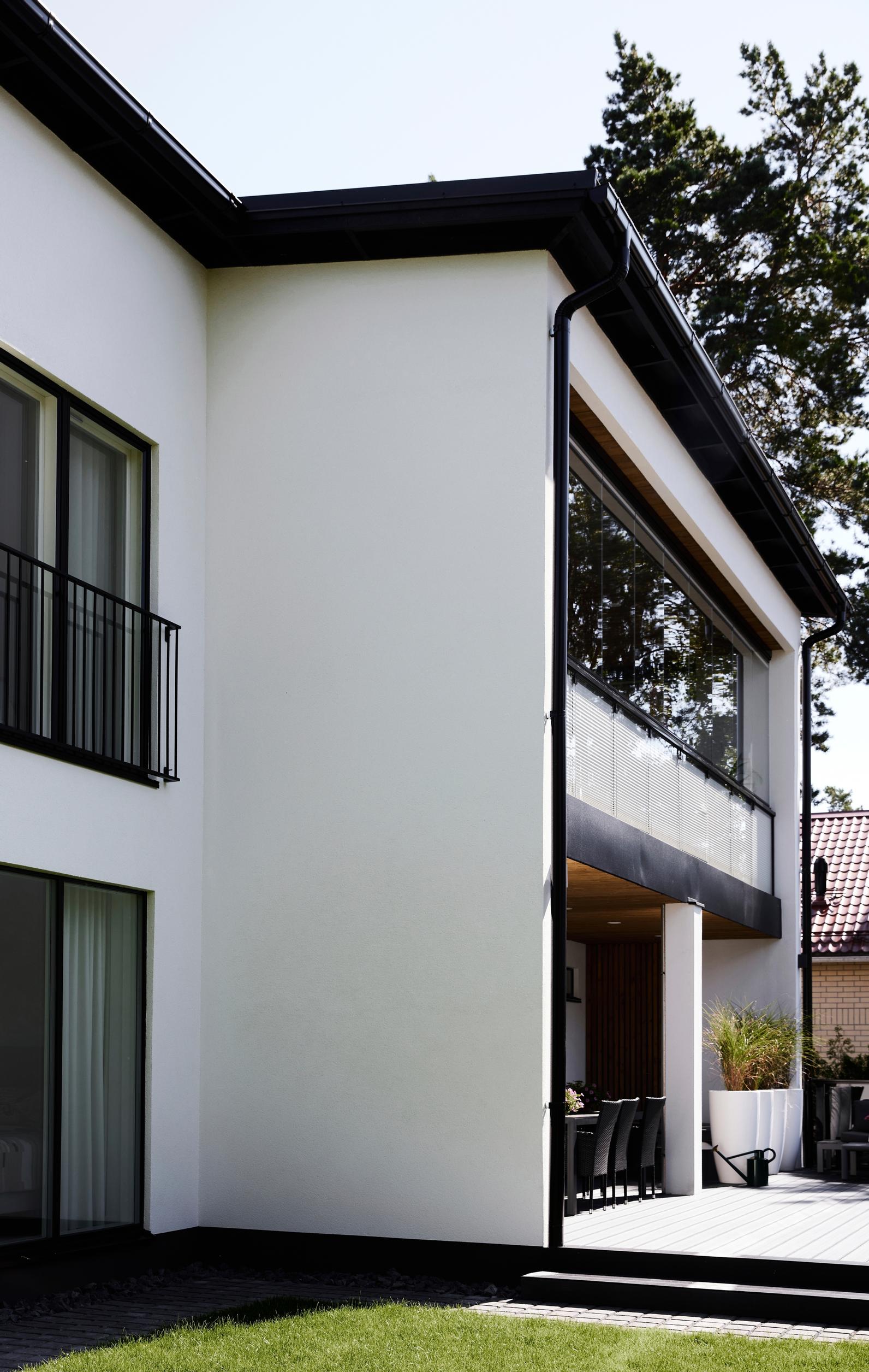 A white two-story single-family house.