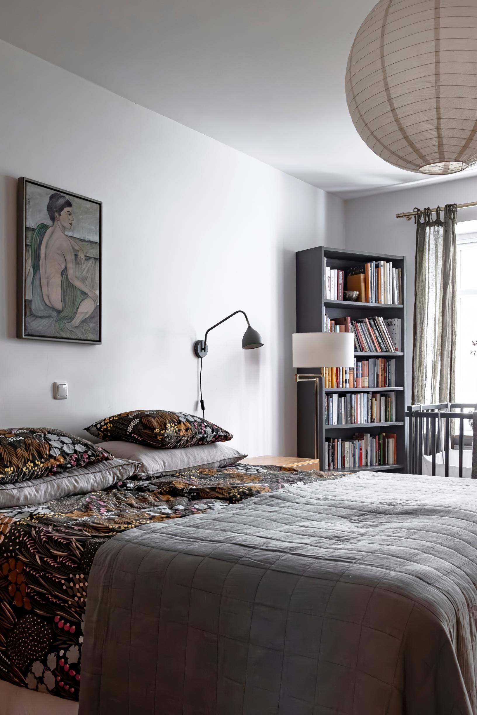 A dark atmosphere in the main bedroom