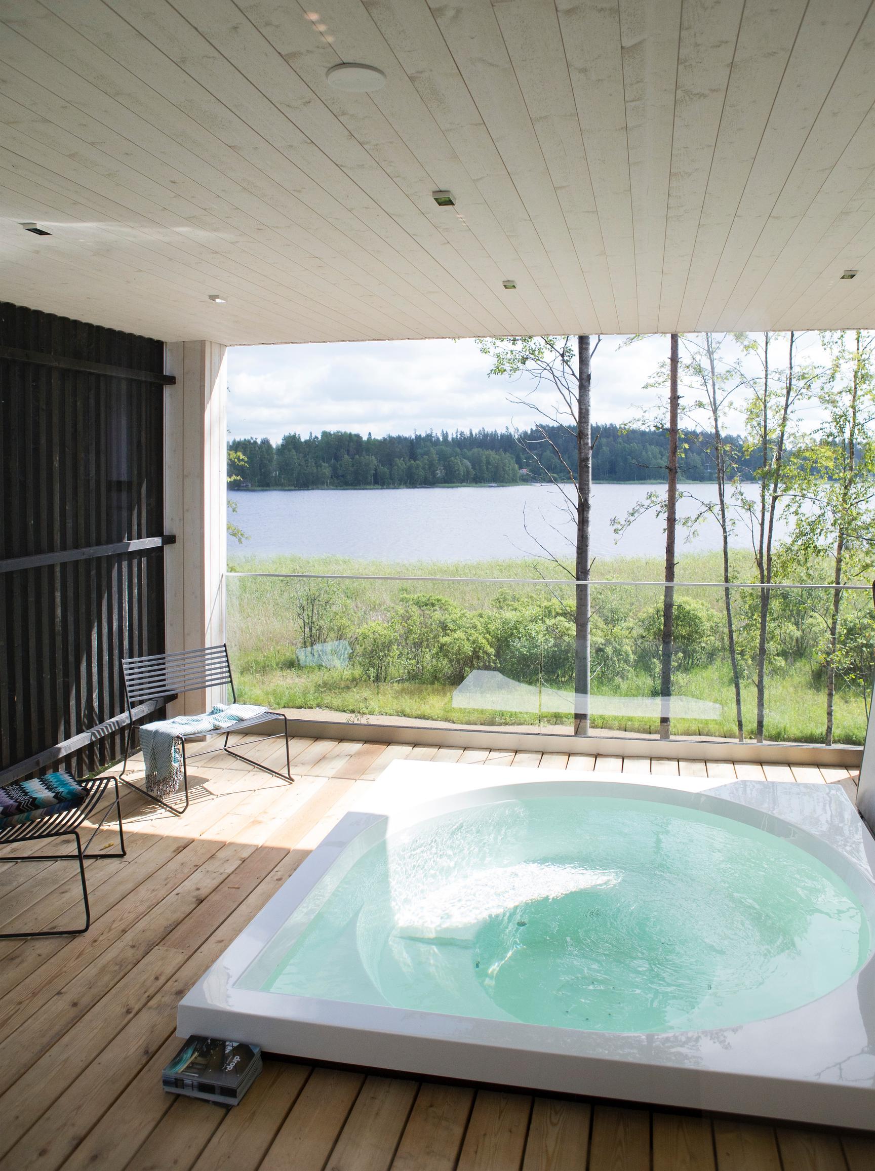 Outdoor hot tub in a housing fair home