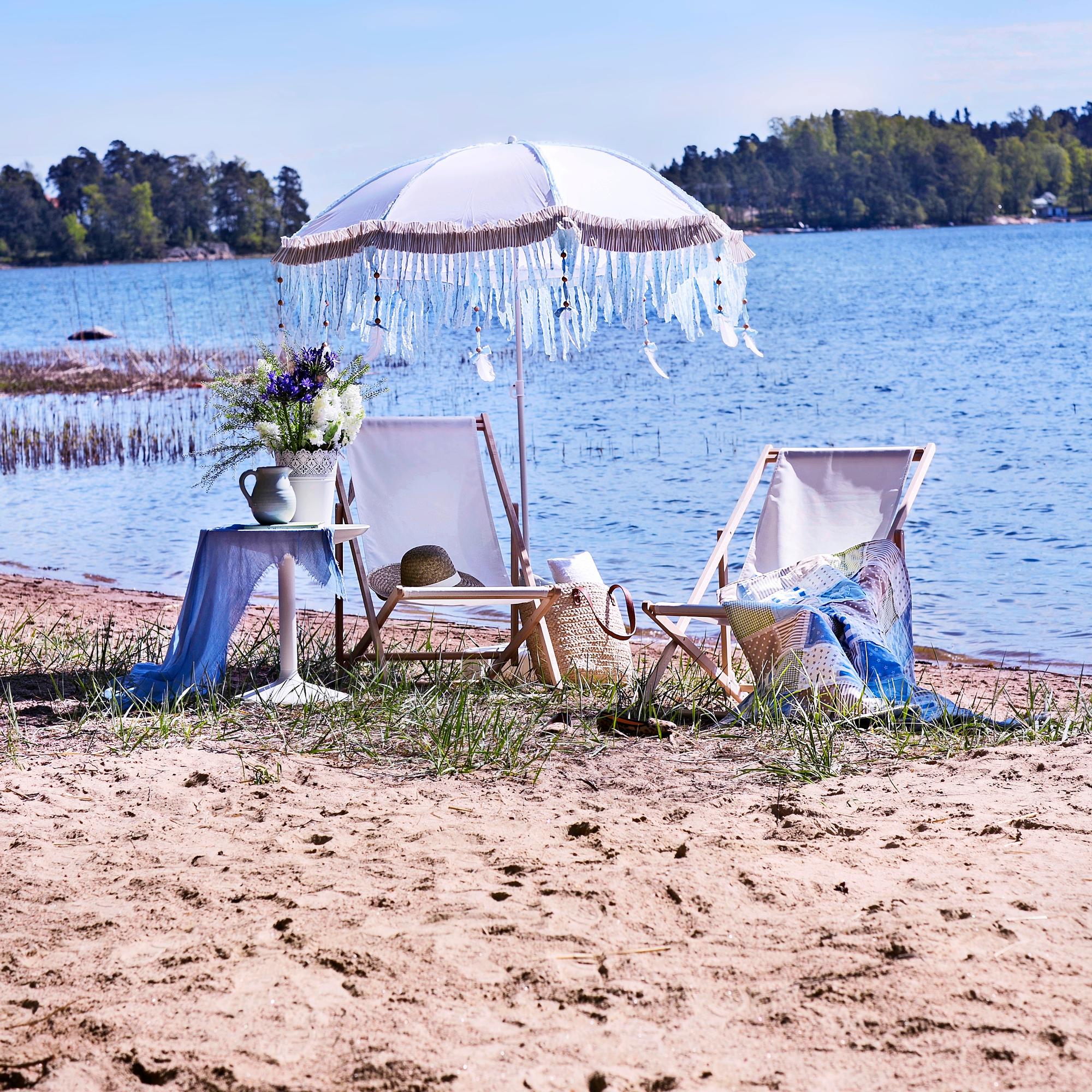 Summer house with a backyard beach—11 tips to create a dreamy beach from a muddy shore