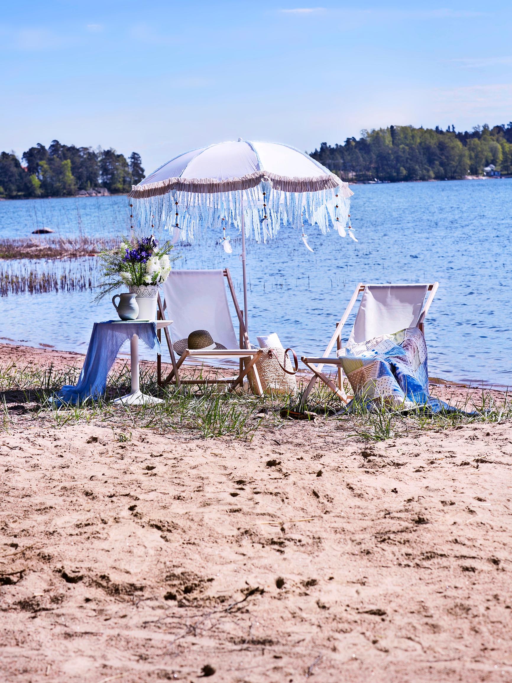 Summer house with a backyard beach—11 tips to create a dreamy beach from a muddy shore