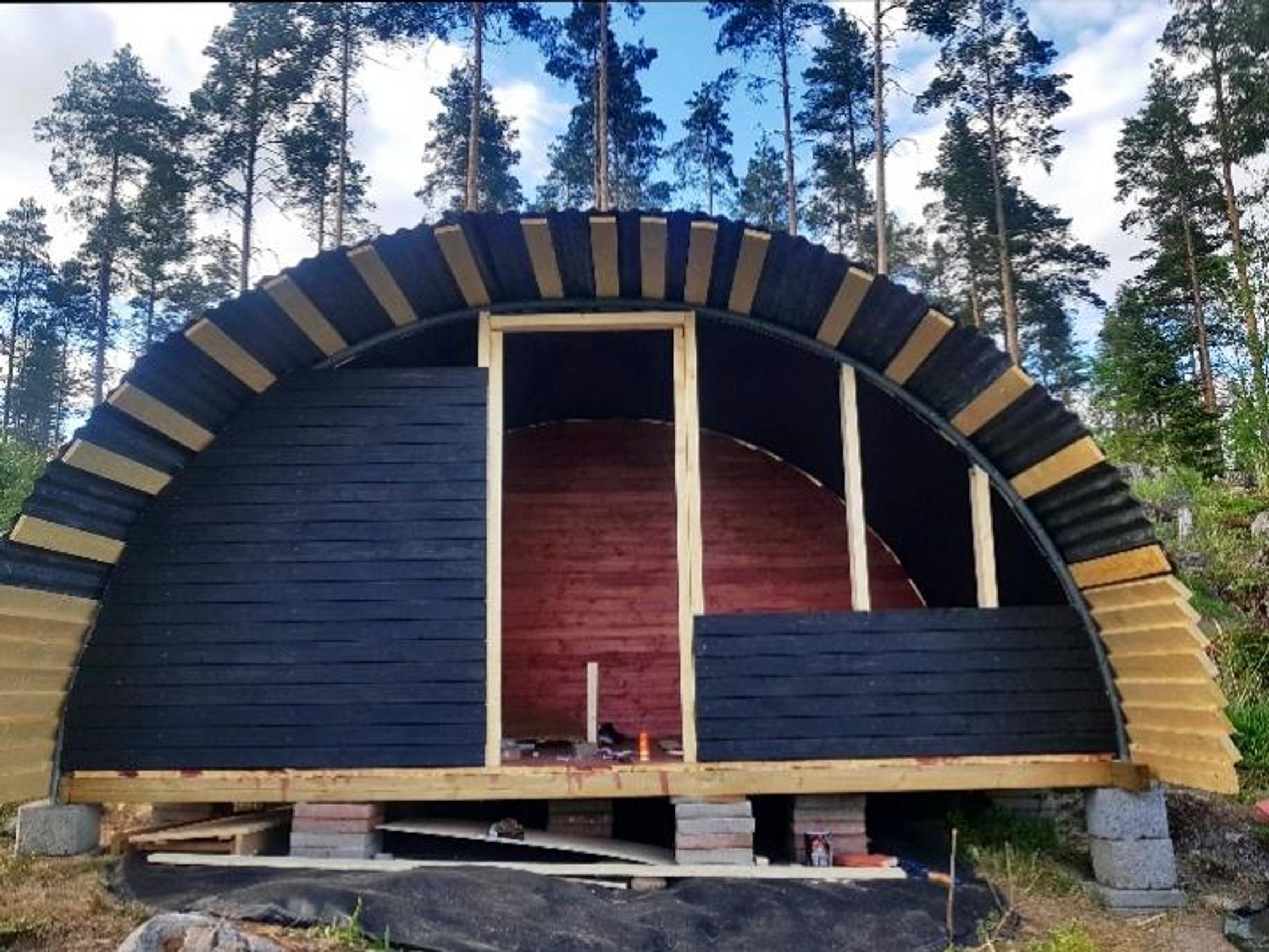 The backyard sauna made from an old trampoline during construction.