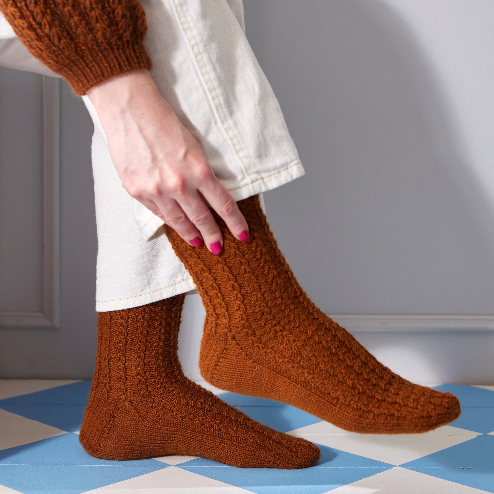 These mock cable socks are like woolly jewelry—and perfect for beginners!