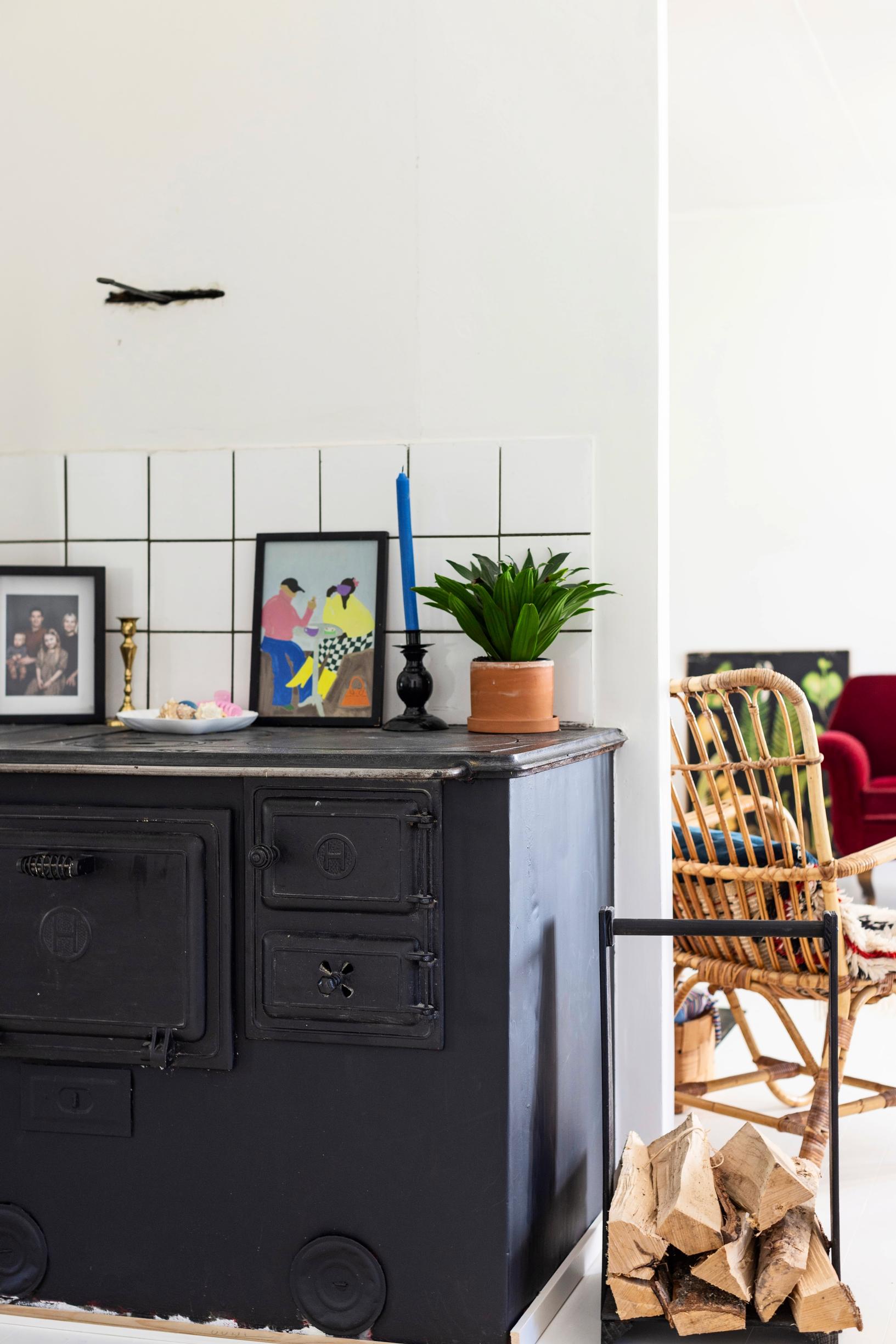 A black wood-burning stove in the cottage
