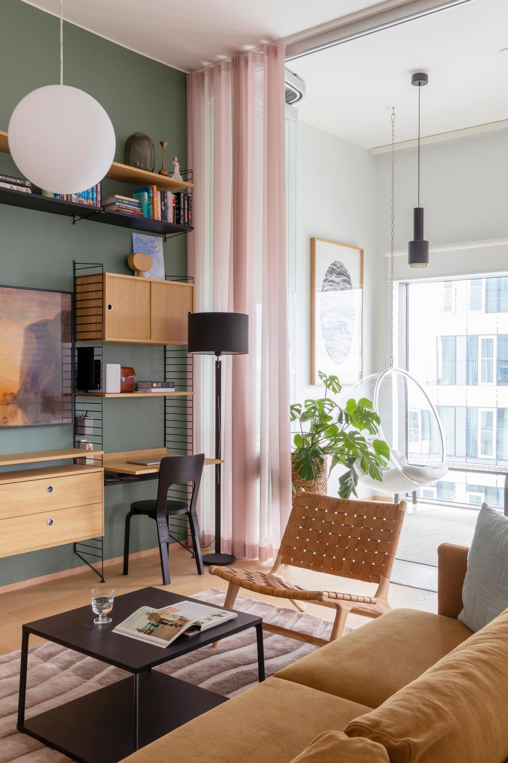 Pink sheer curtain used as a room divider