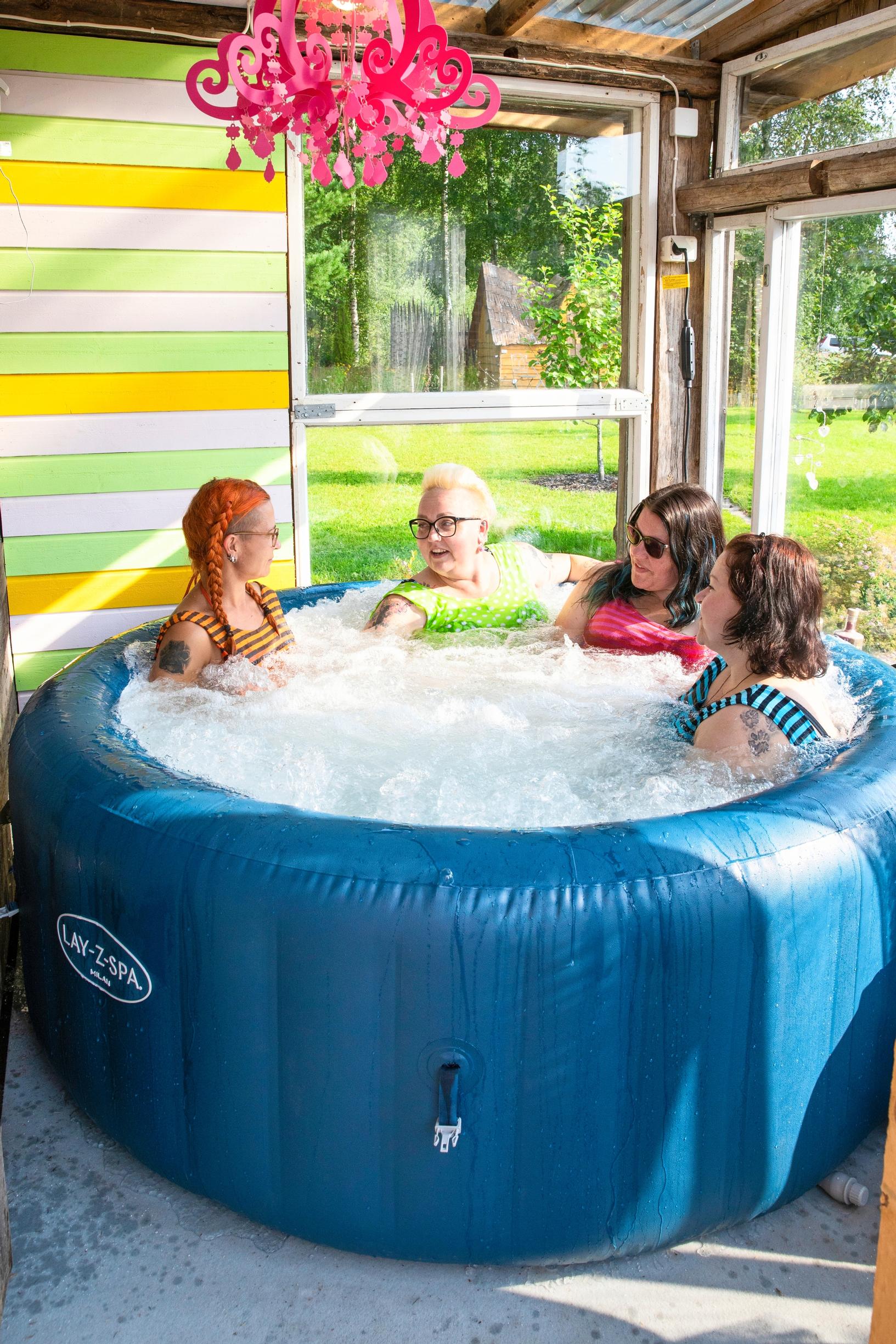 Päivi Färm and friends in the hot tub