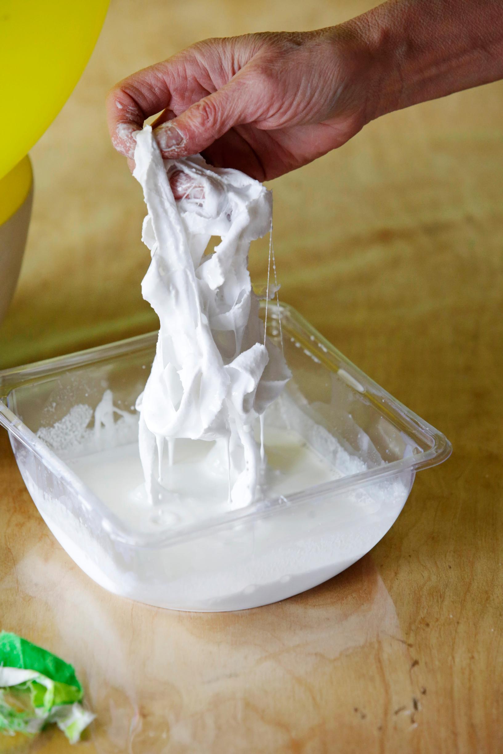 A fabric strip in a glue-water bath