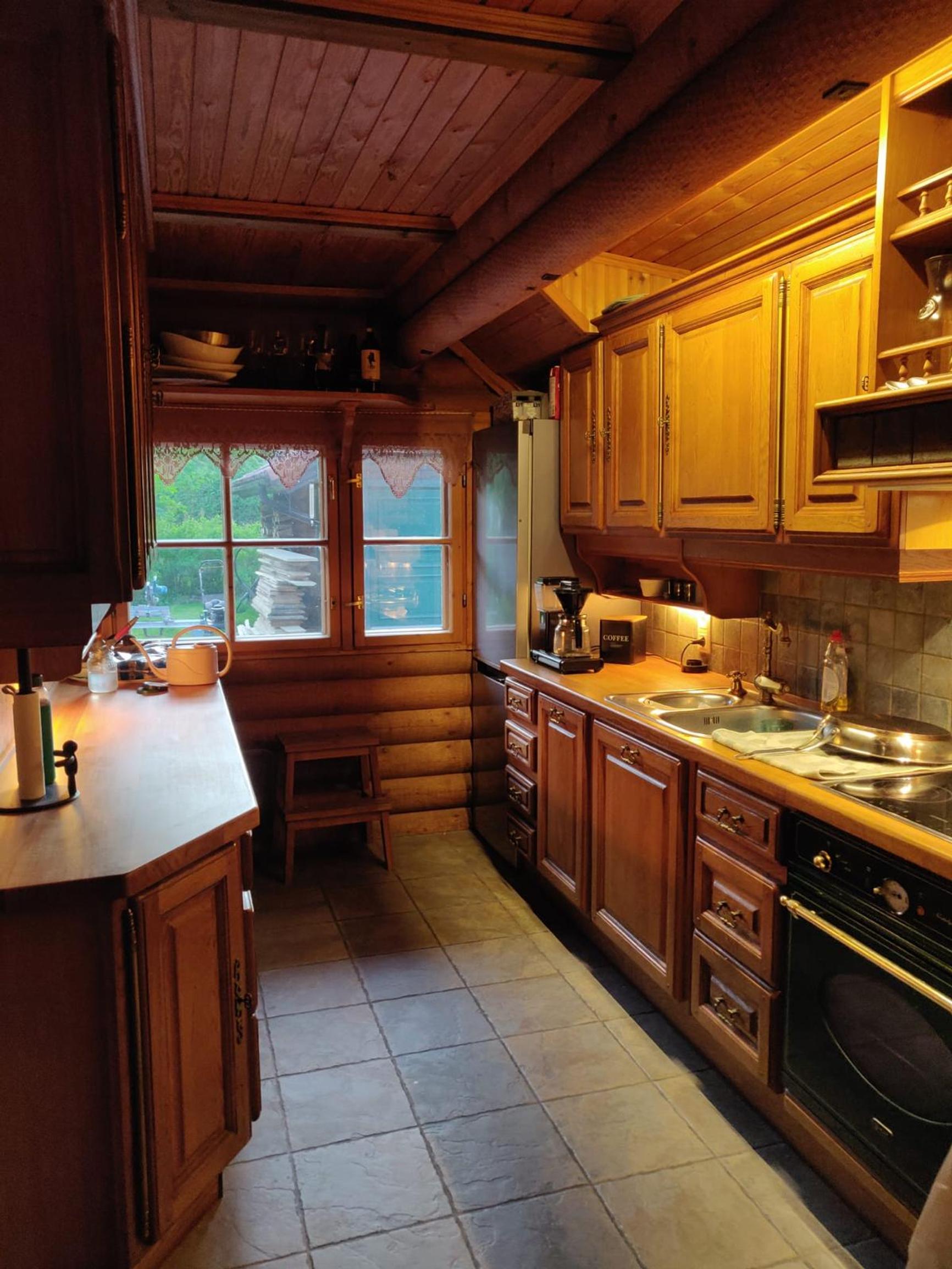 The log house’s former wooden kitchen.