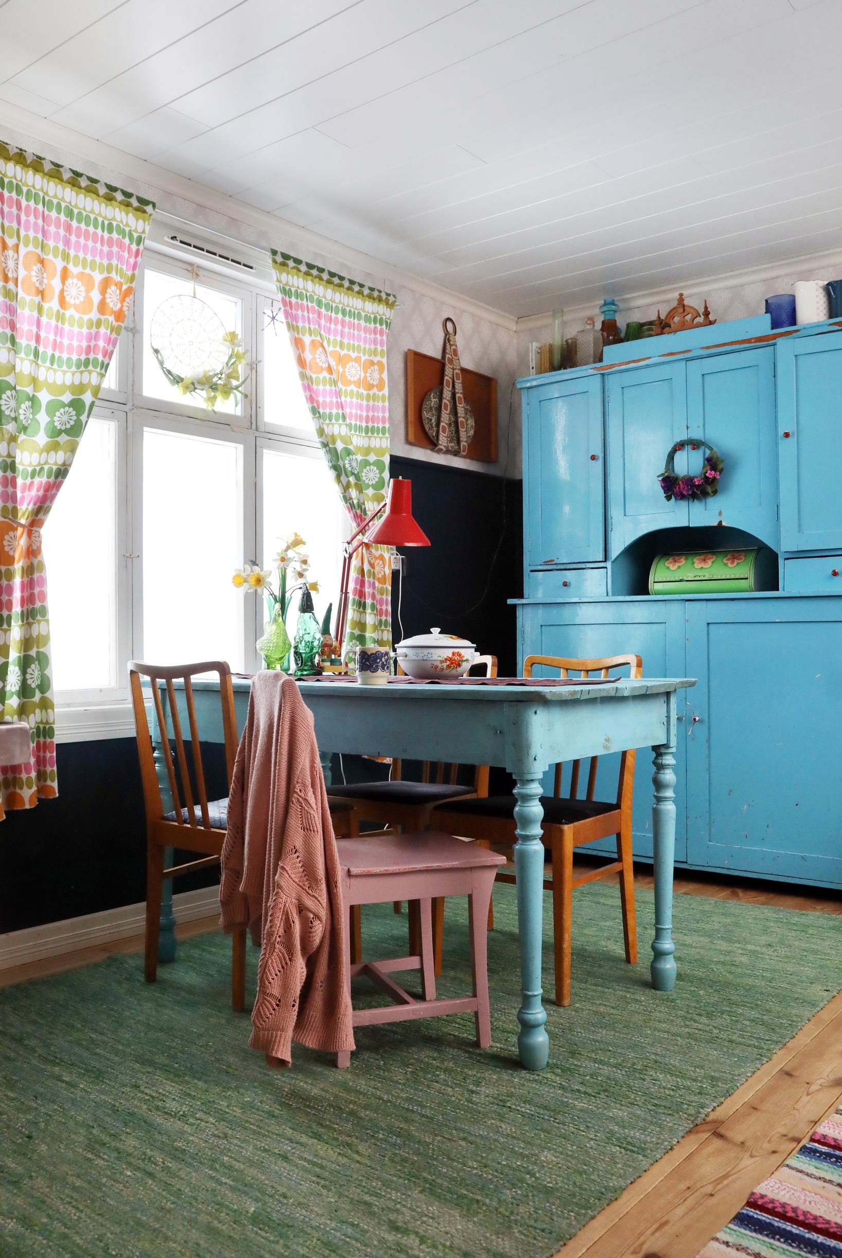 The turquoise-blue kitchen table rescued from the fire.
