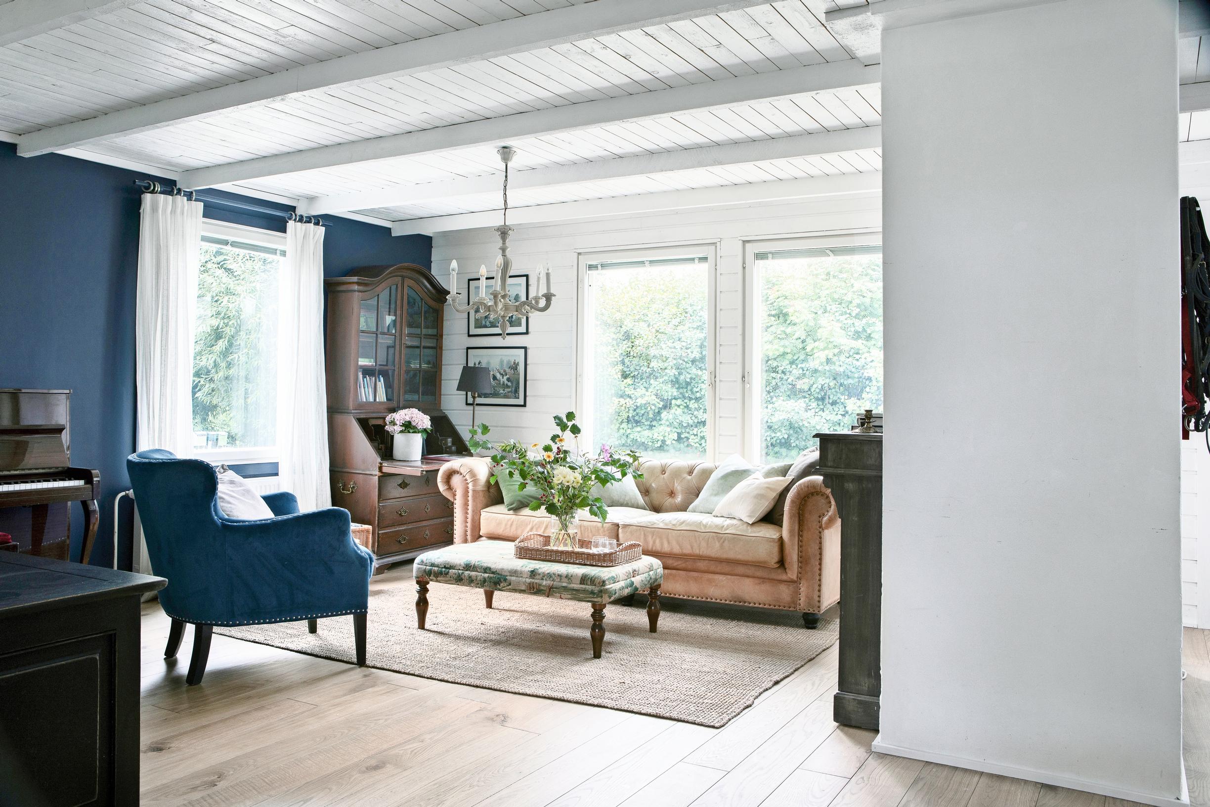 a living room with a British style
