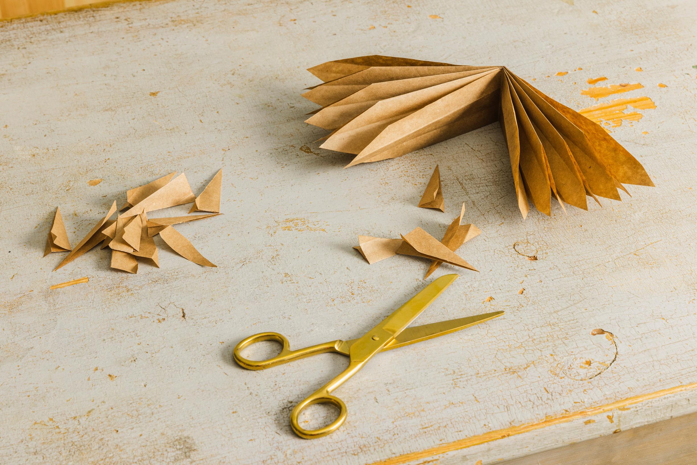 Layered star step 4: the bundle’s tips are cut into triangles.