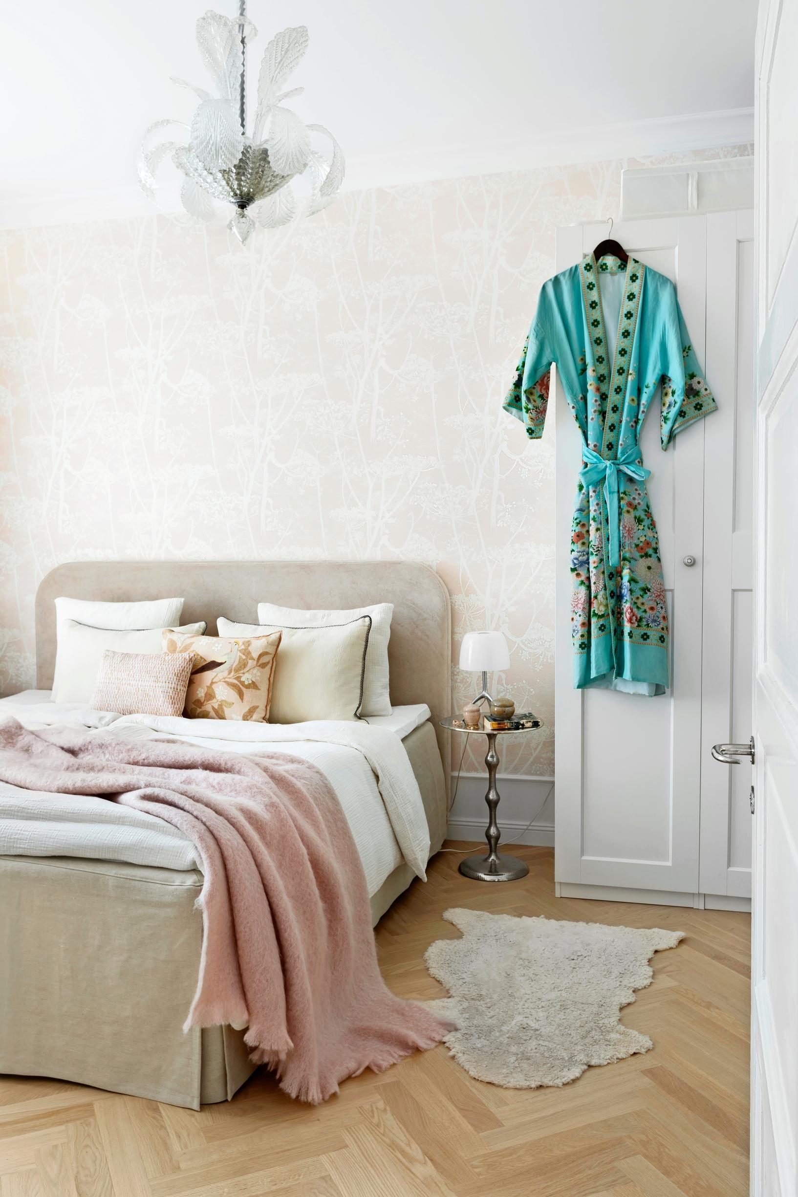 The bedroom is adorned with grandmother’s silk robe.
