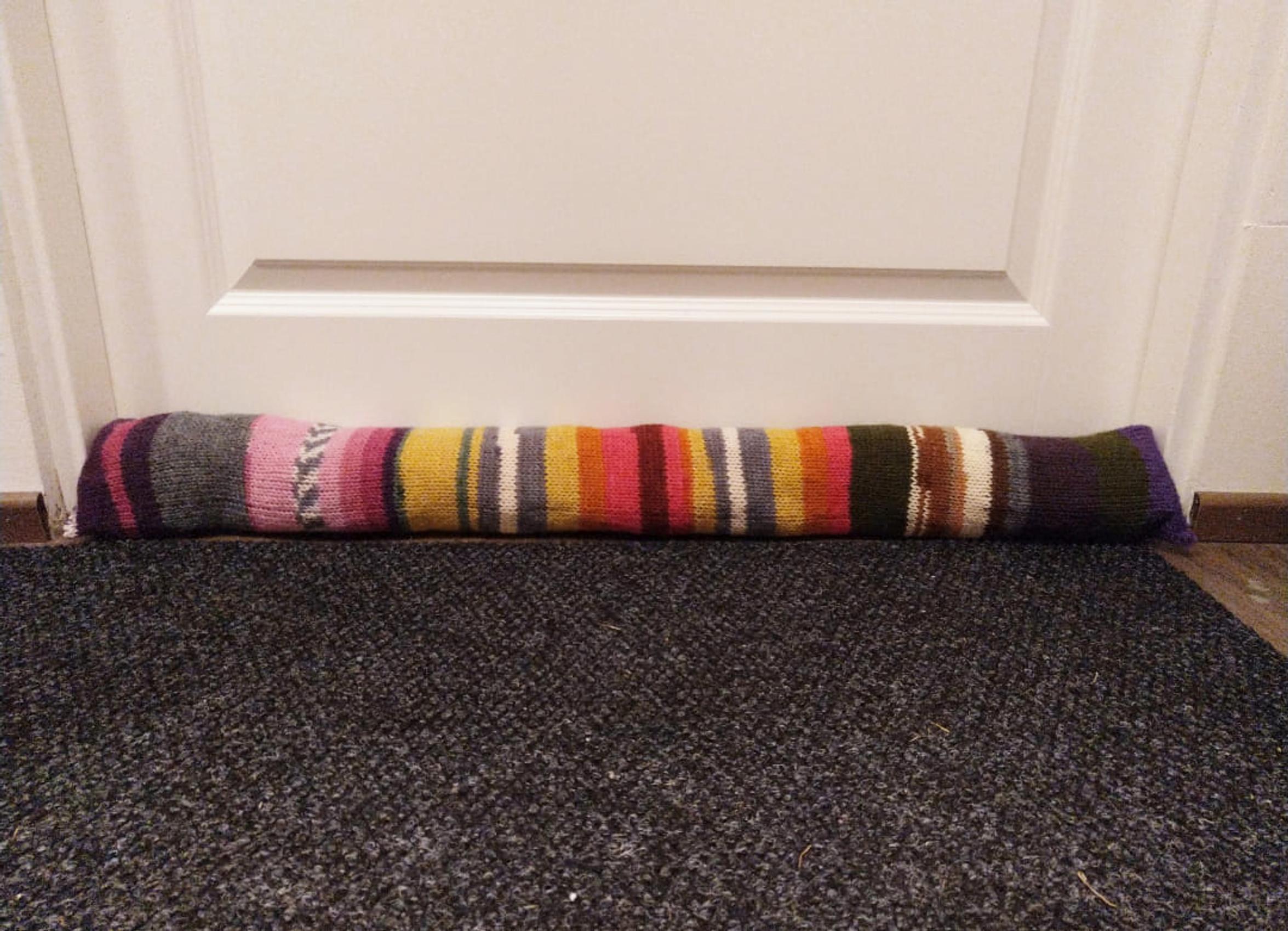 Sanna Loponen’s draft stopper in front of a door