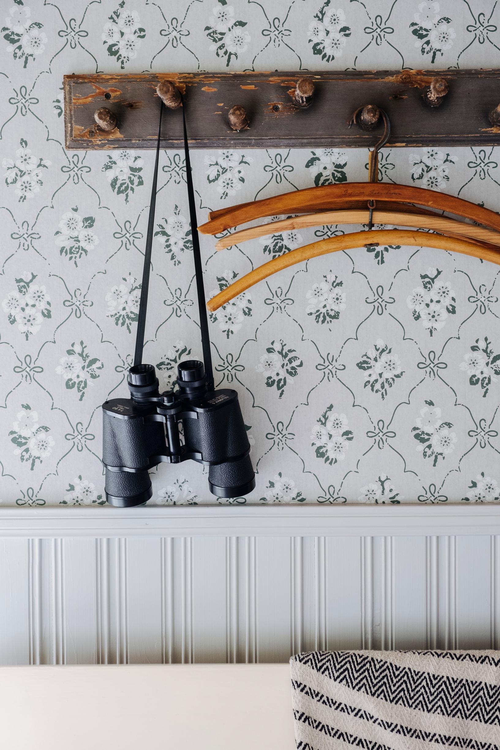 Binoculars hanging on a rack