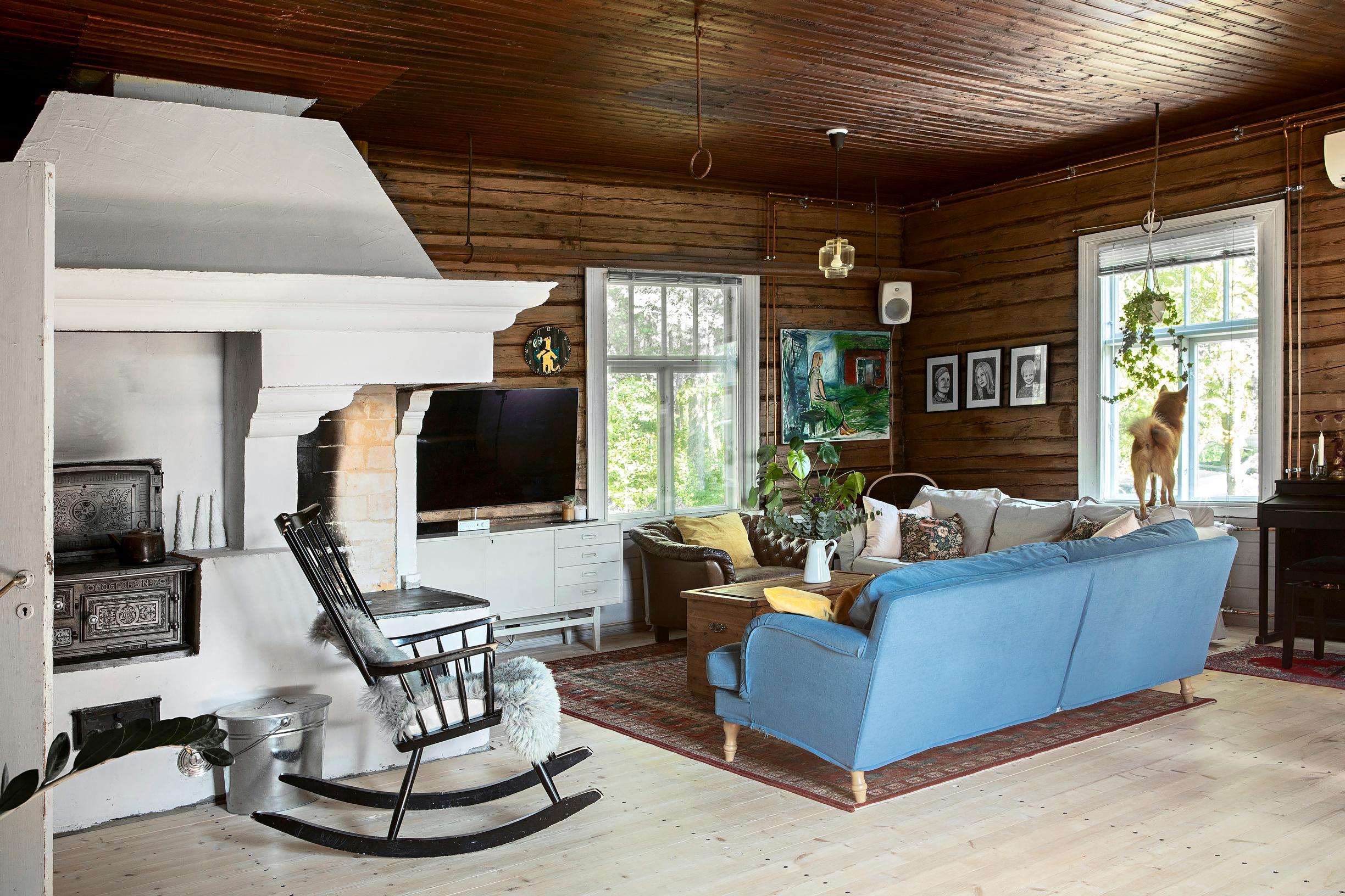 The main room of the old log house with log walls