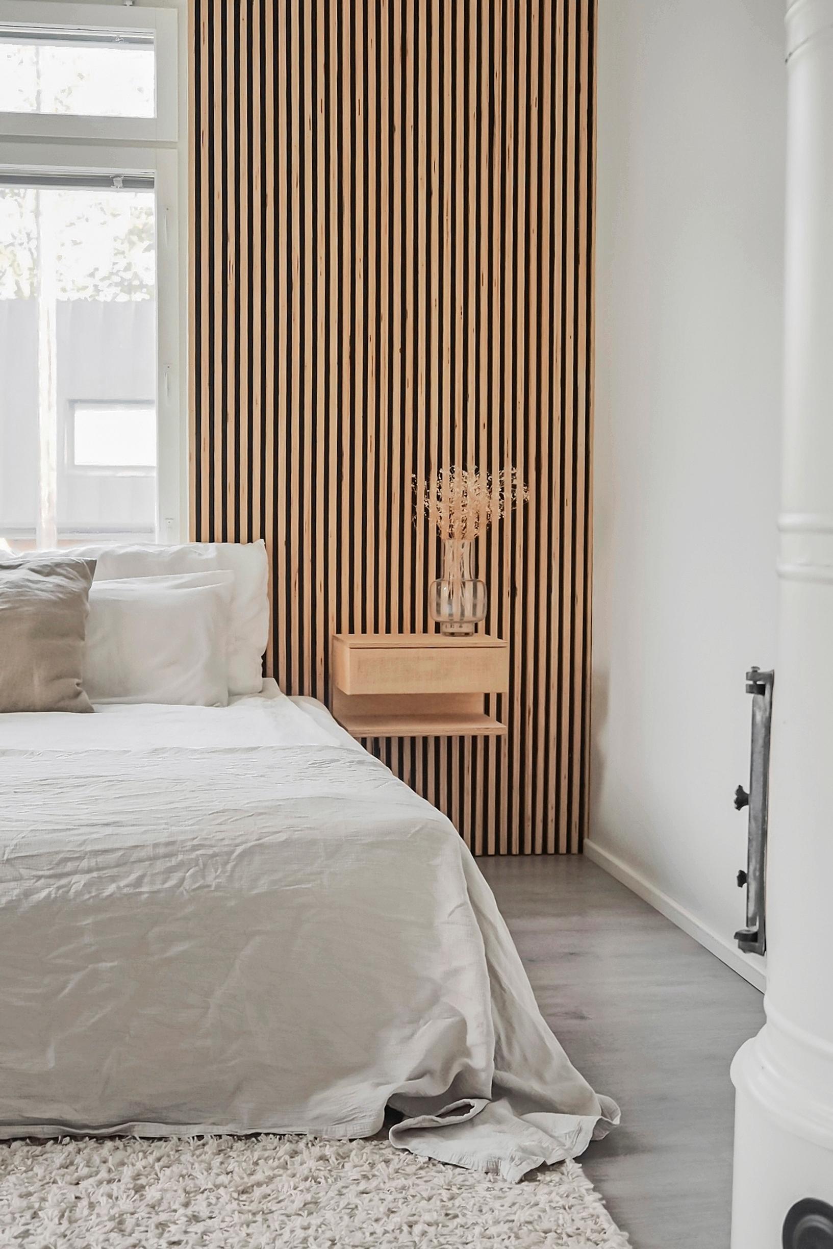 The wall-mounted bedside table ready to use