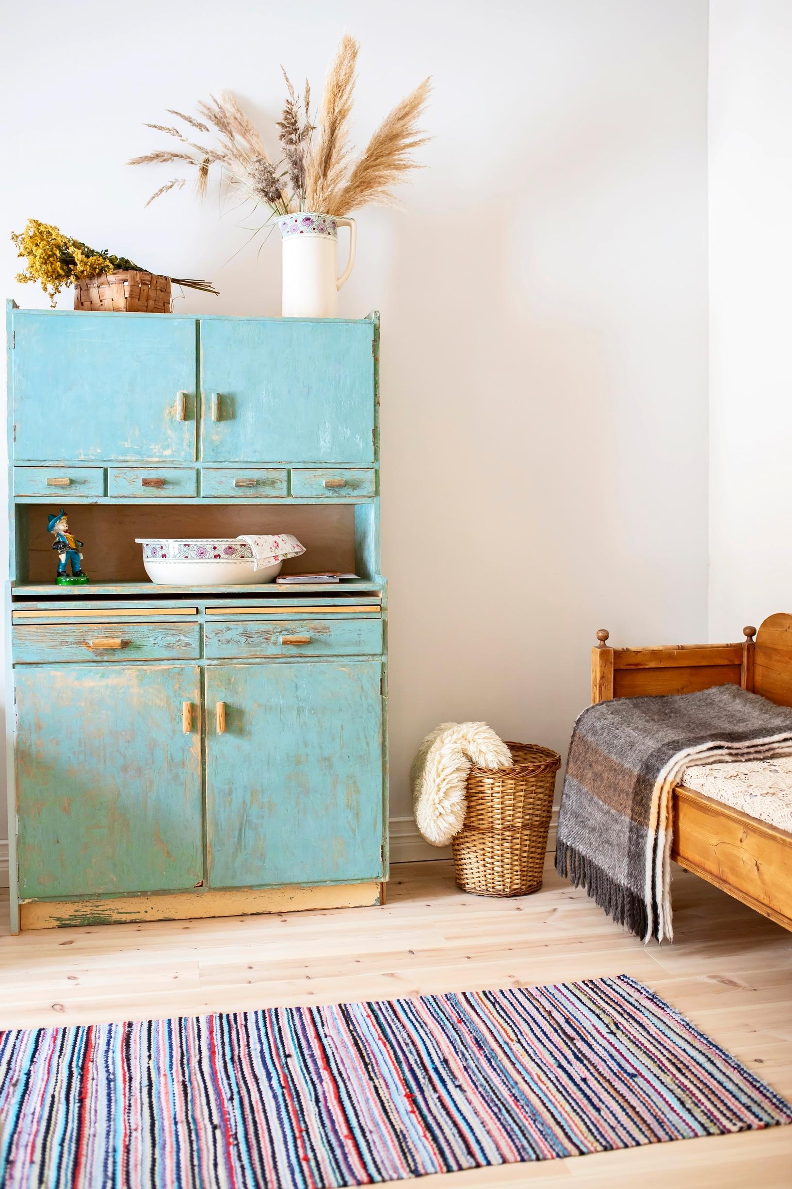 A mint-green hostess cupboard in the vicarage’s former maid’s chamber