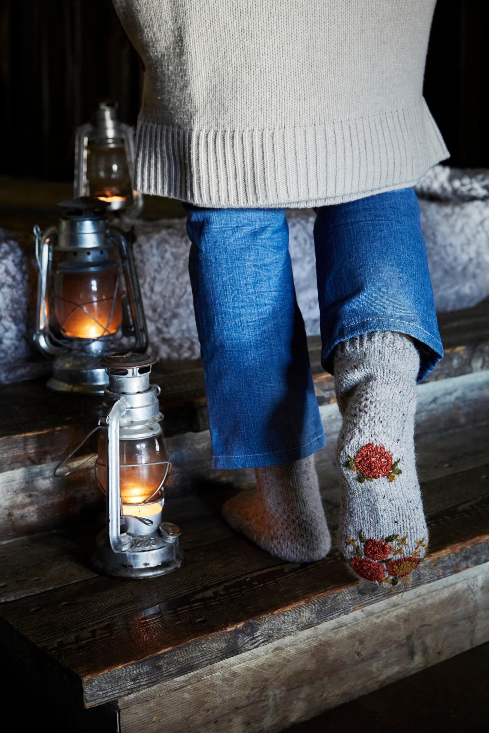Wool socks decorated with leftover yarn