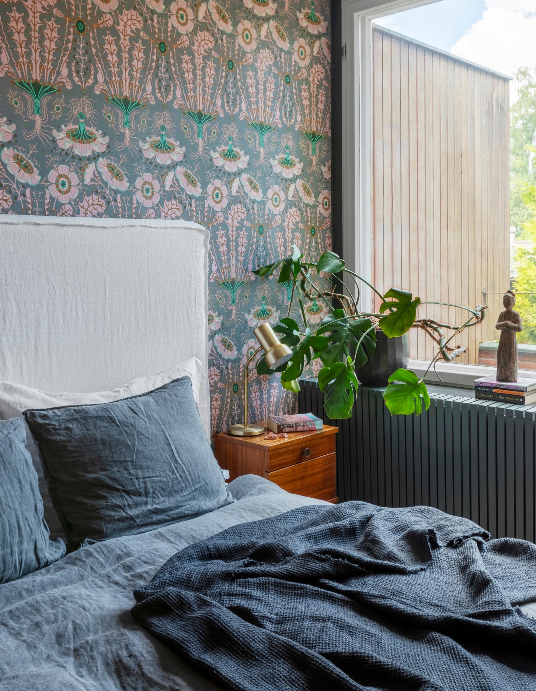 Klaus Haapaniemi’s mysteriously captivating Equinoxe wallpaper in the bedroom