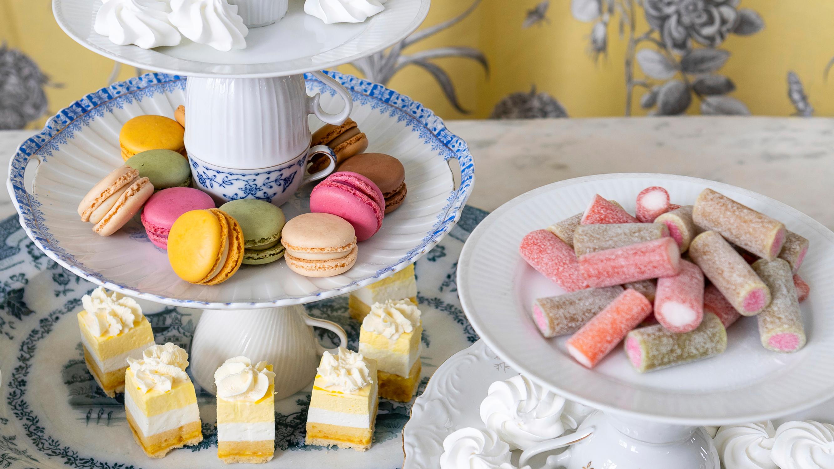 Create a charming tiered tray from mismatched dishes—simply separate with water after the party!