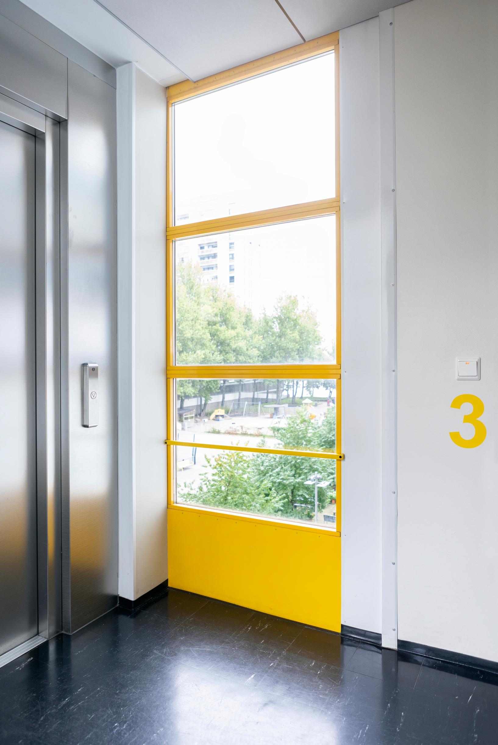 A yellow window in the stairwell