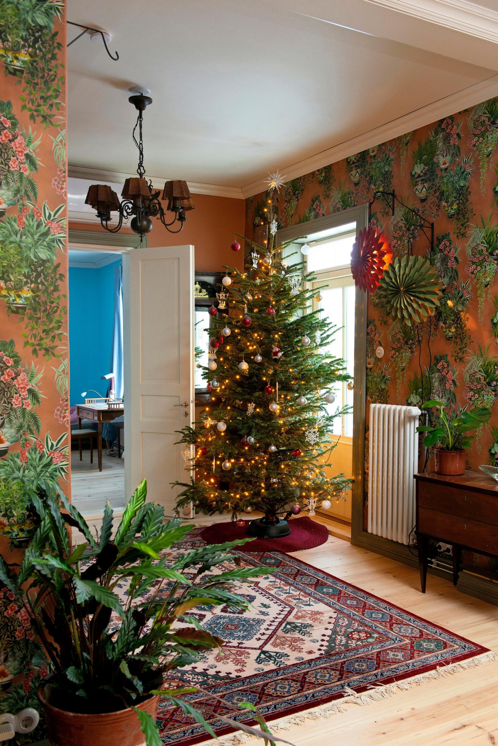 Downstairs and a large Christmas tree.