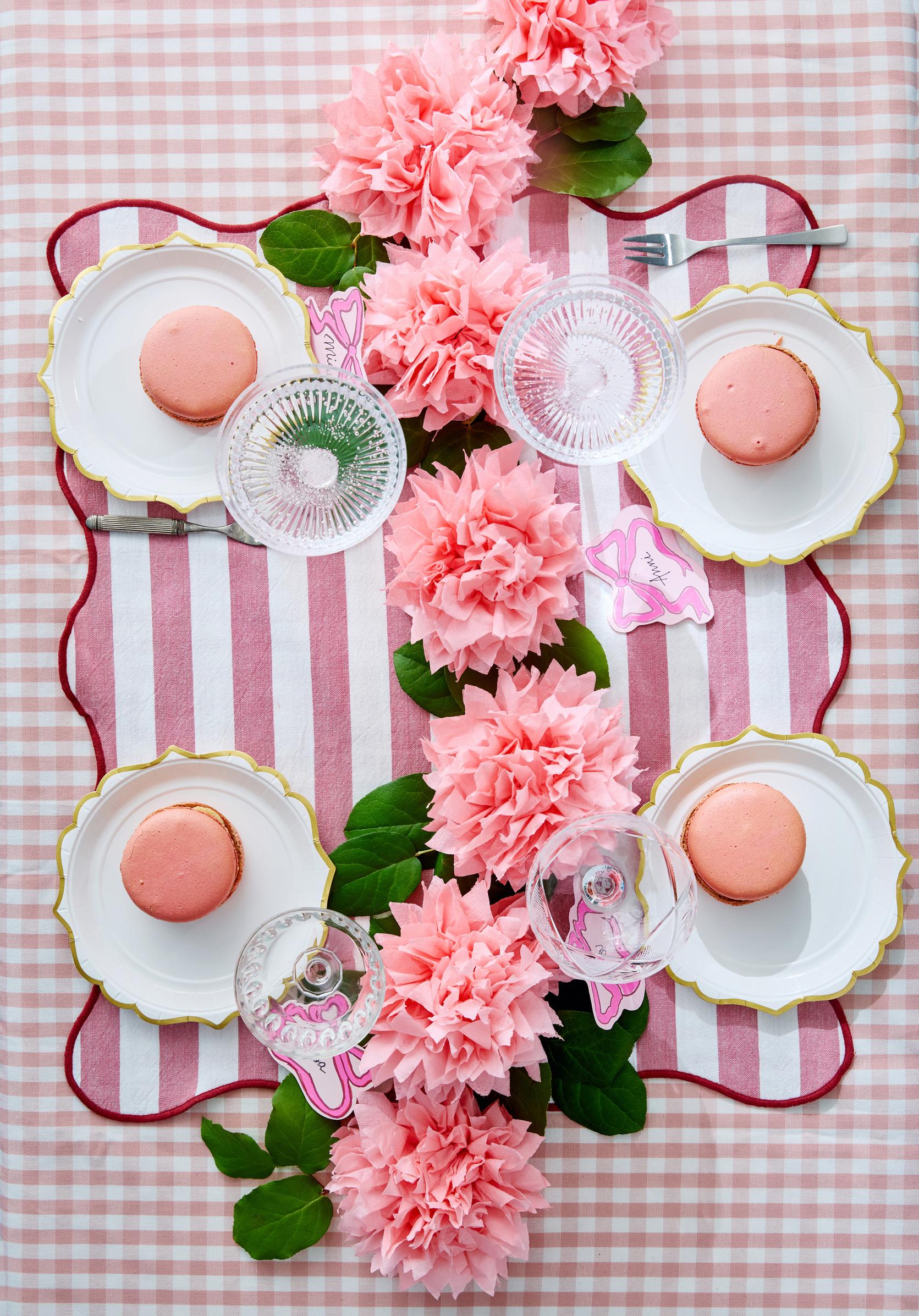 Napkin flower garland in a table setting
