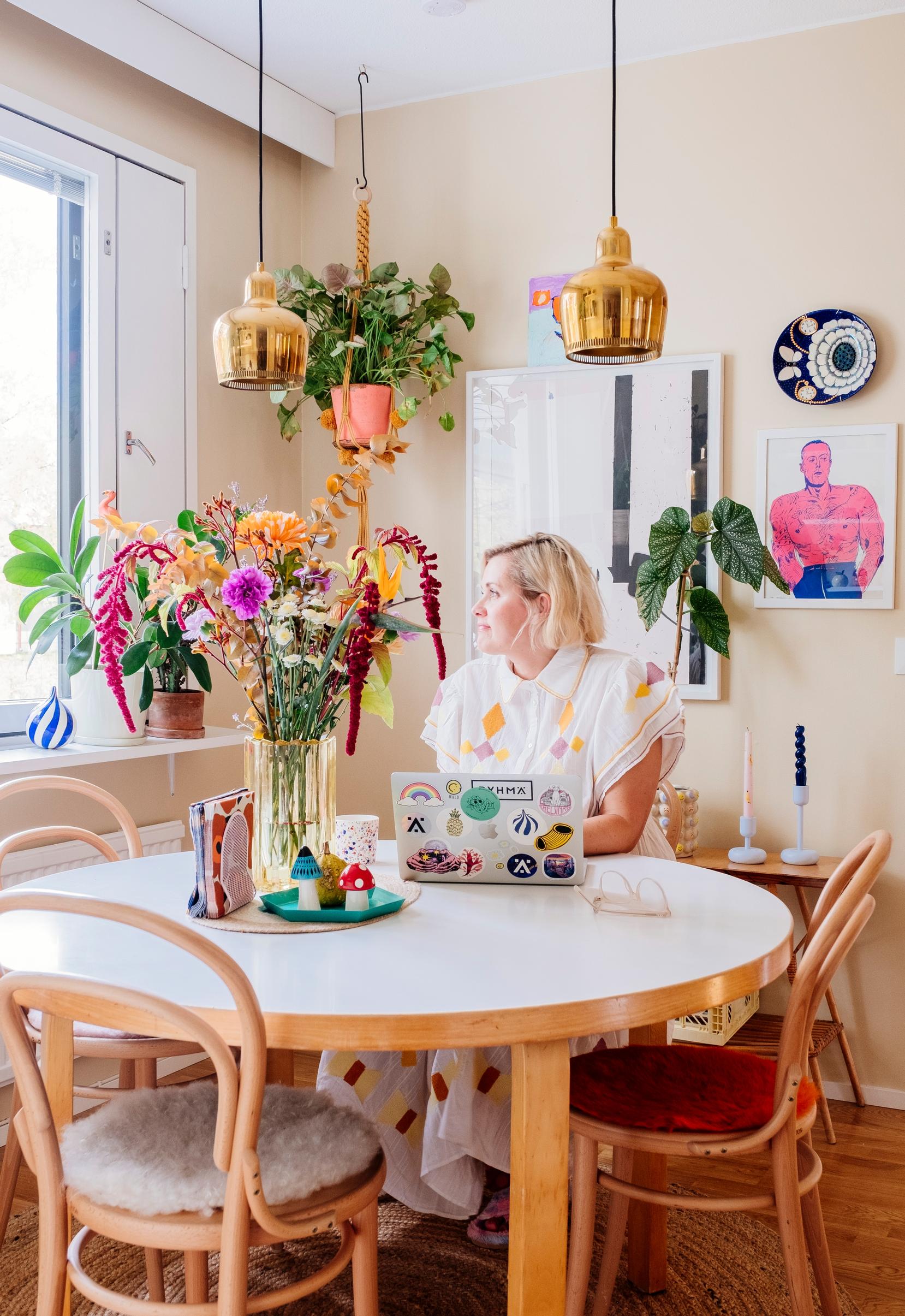 Elina standing in the dining area