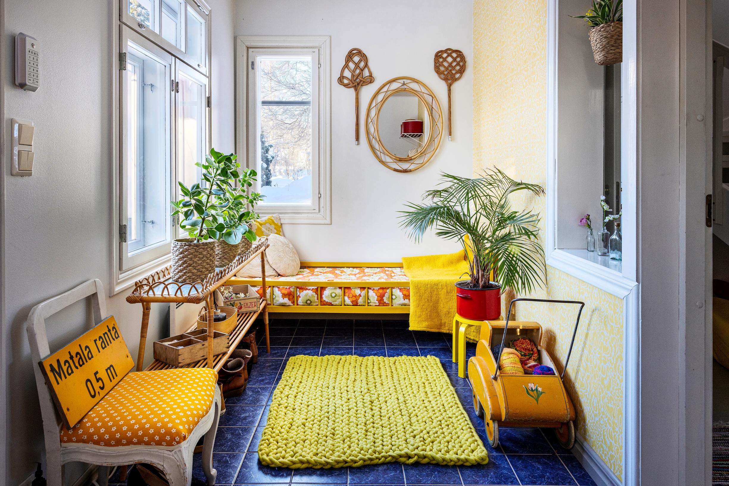A porch decorated in yellow.