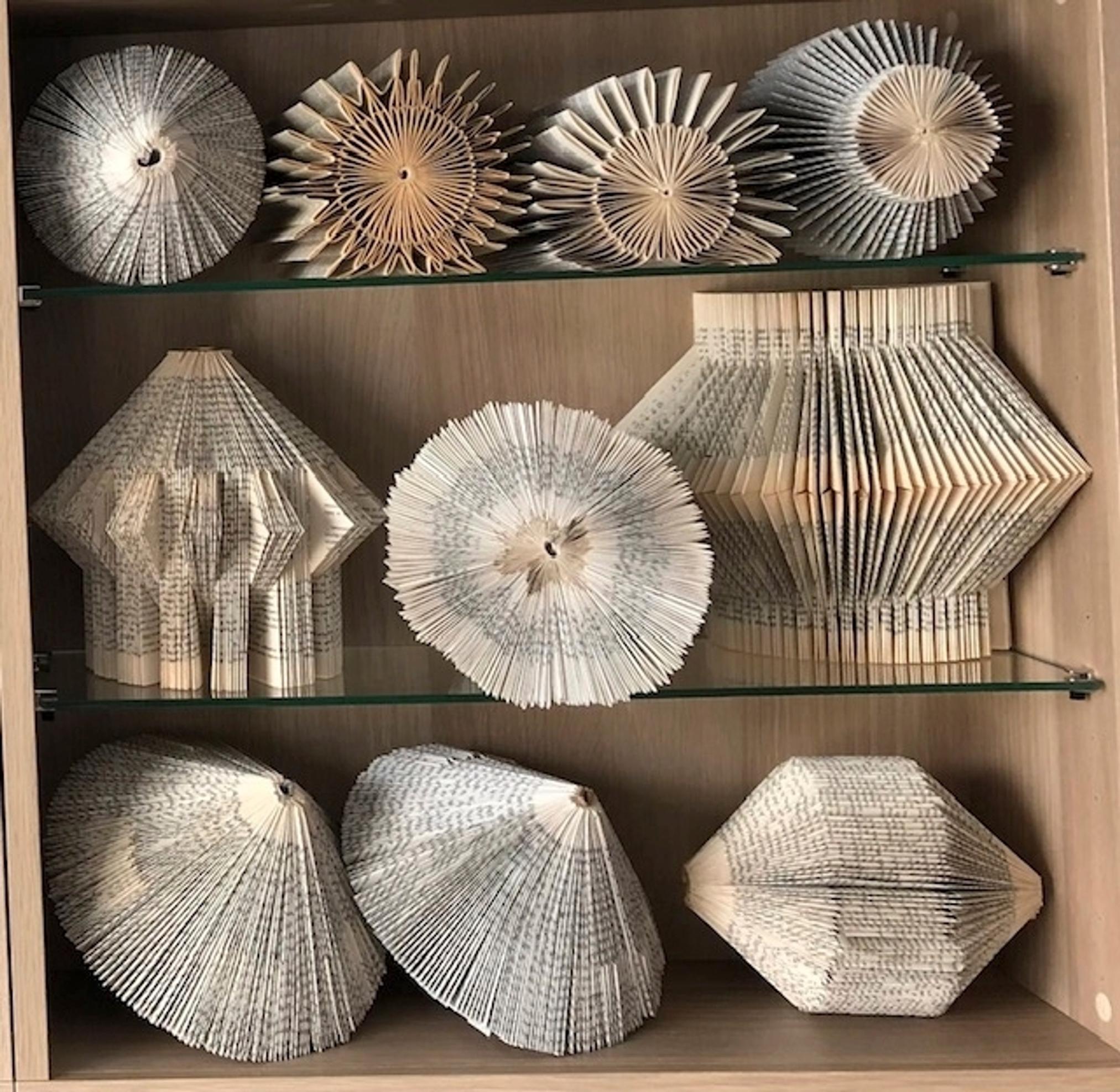 folded books on a shelf