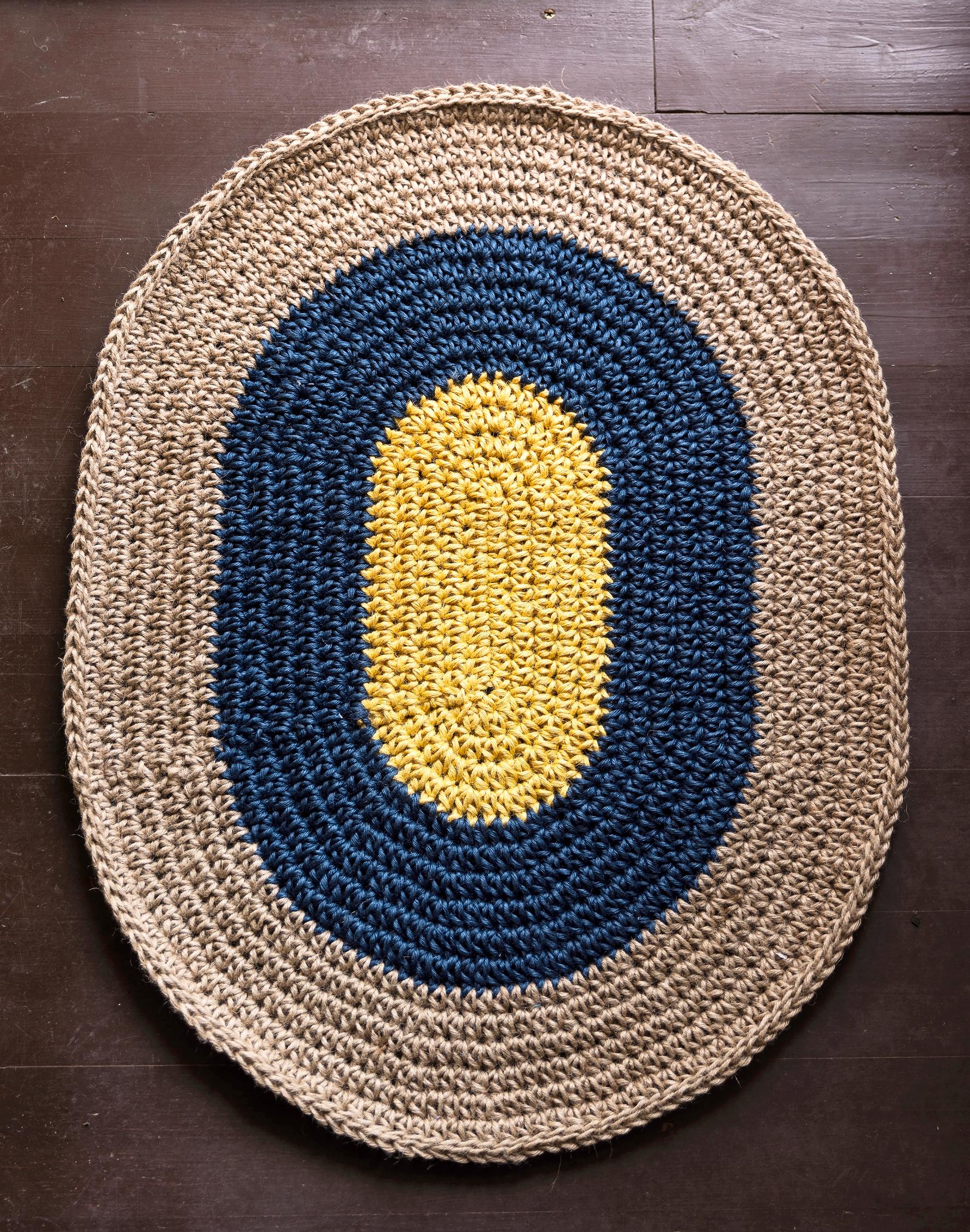 Crocheted oval-shaped doormat