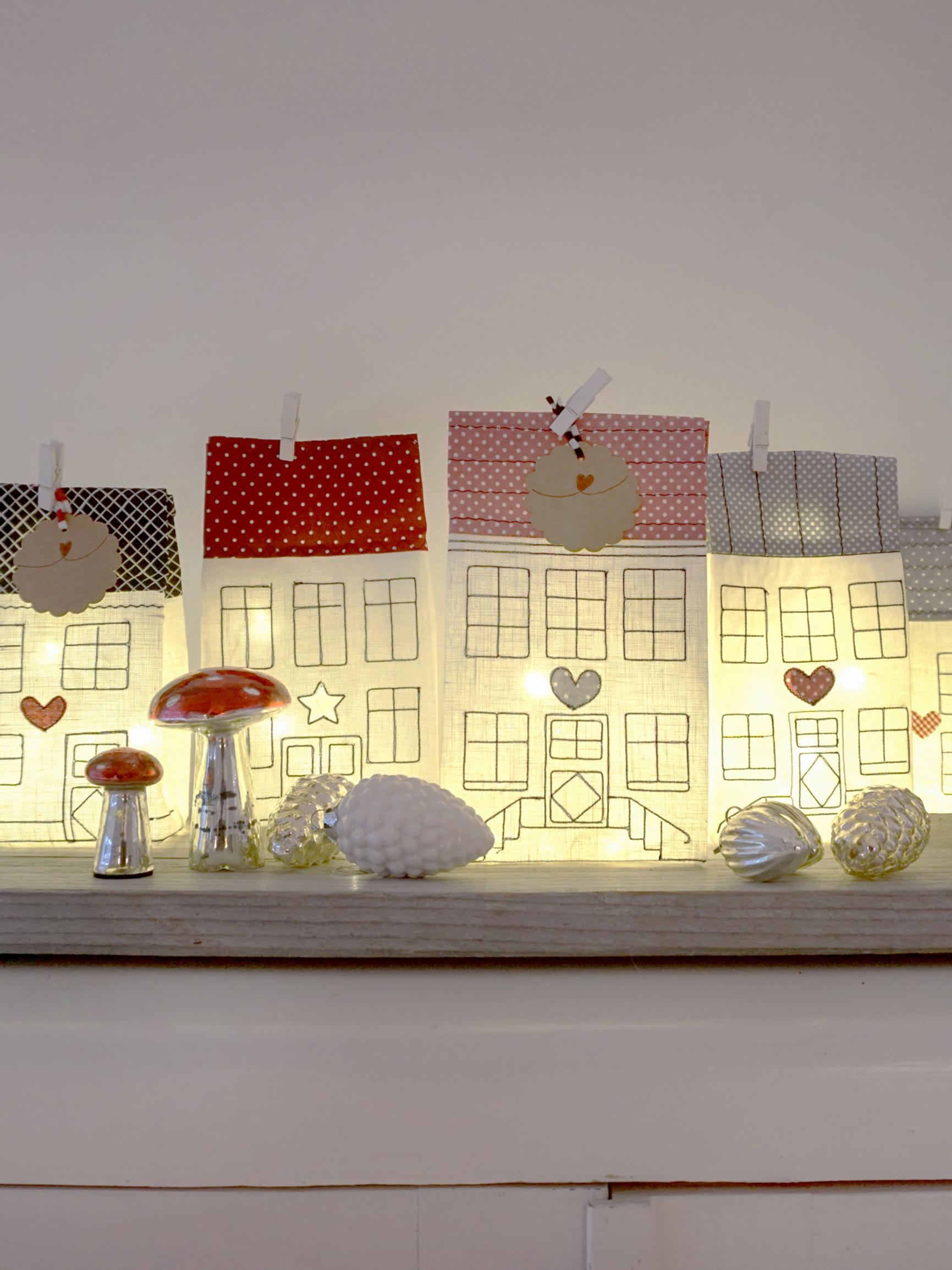 Sew a twinkling village for cozy nights—free house lantern template included