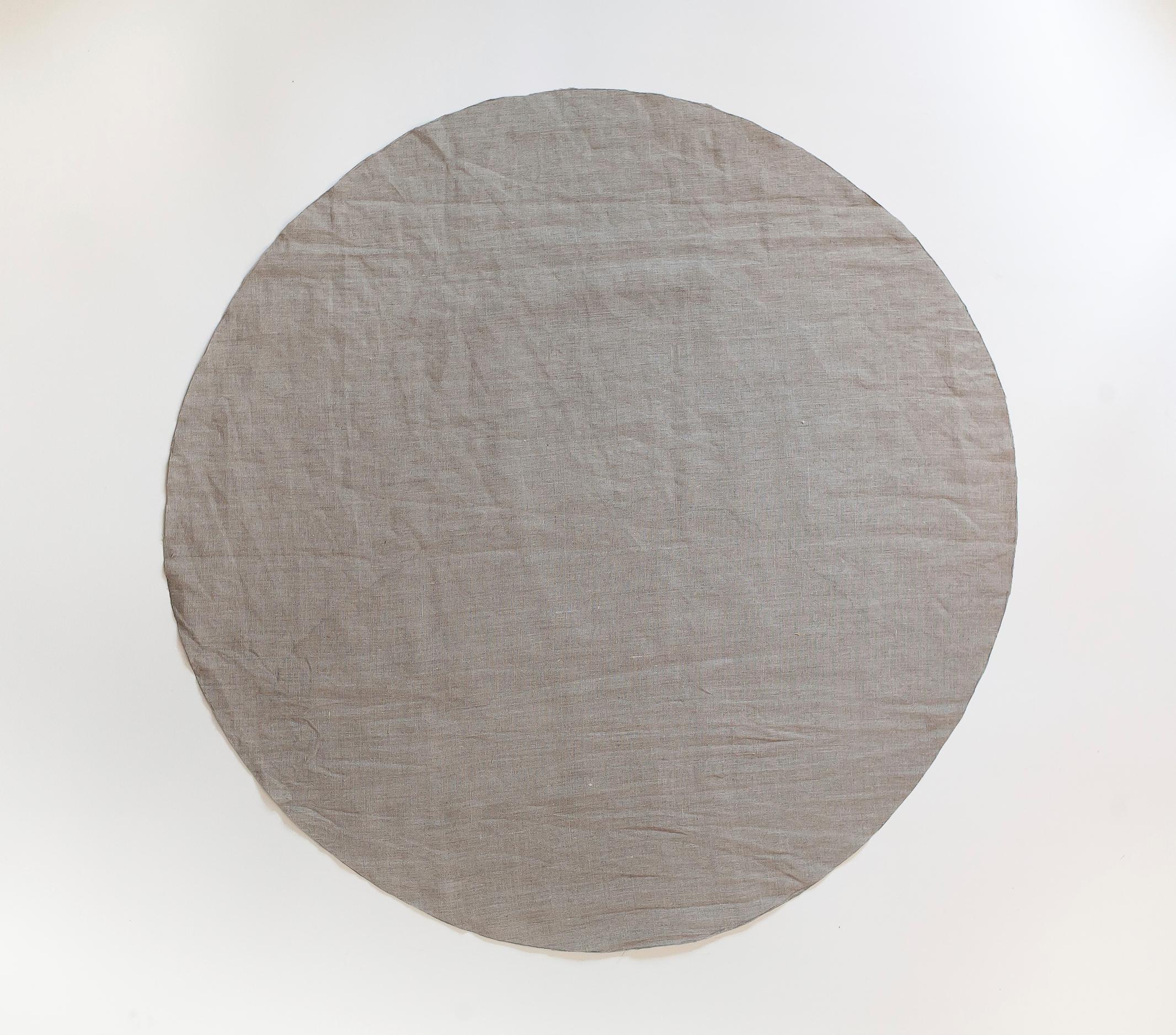 Fabric cut into a circle for the pet bed