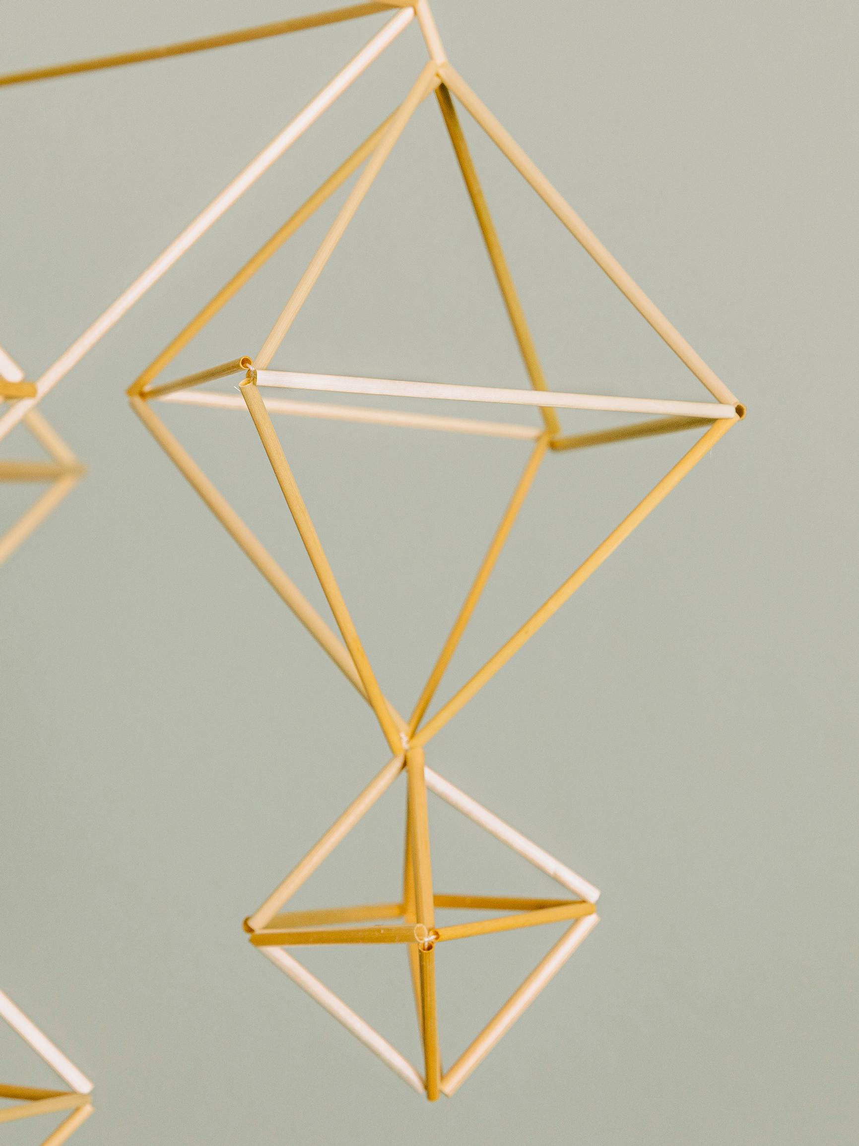 A small and medium basic mobile shape assembled from narrow straws