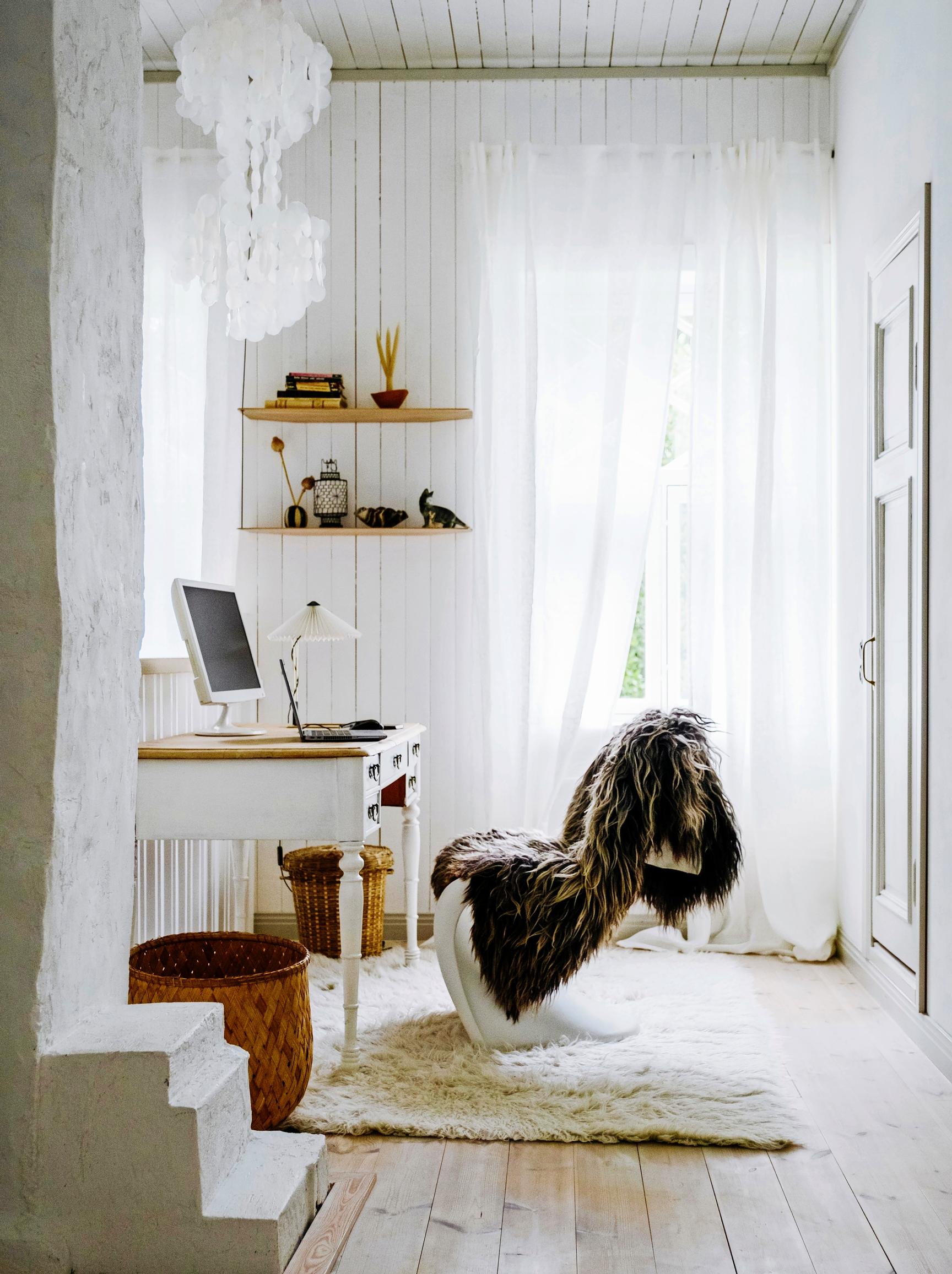 Sohvi has a bright remote-work station in the upstairs hallway.