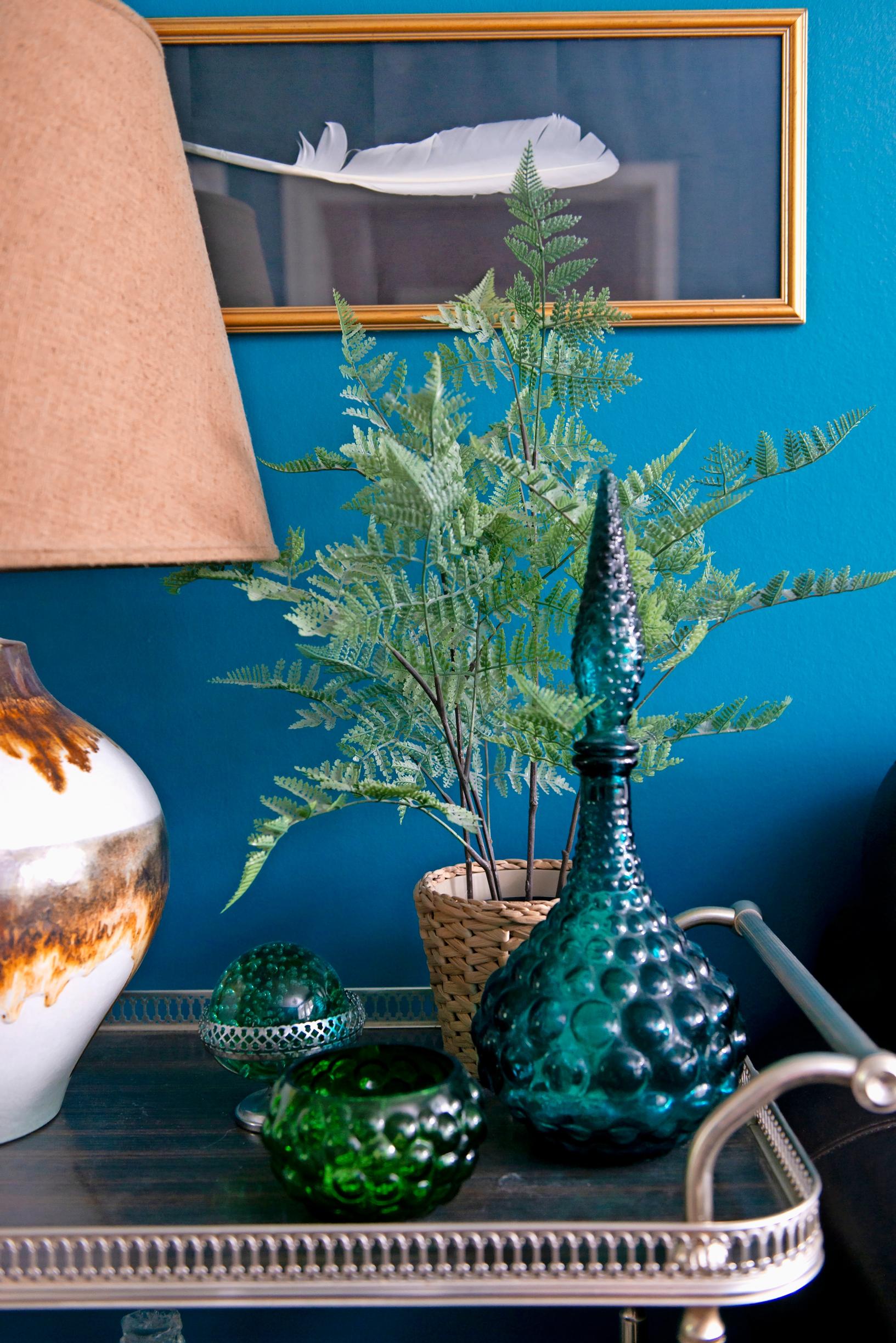 Italian glass carafe on a serving cart