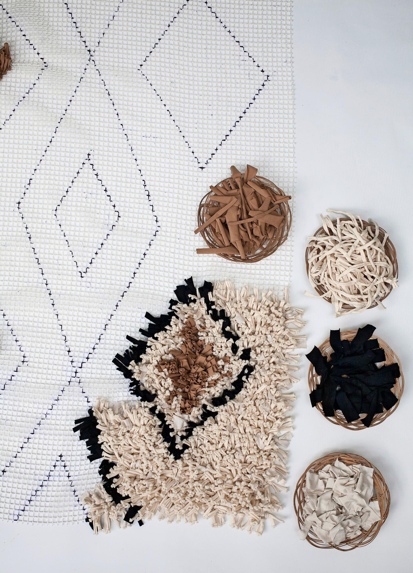 A rug made from jersey strips.