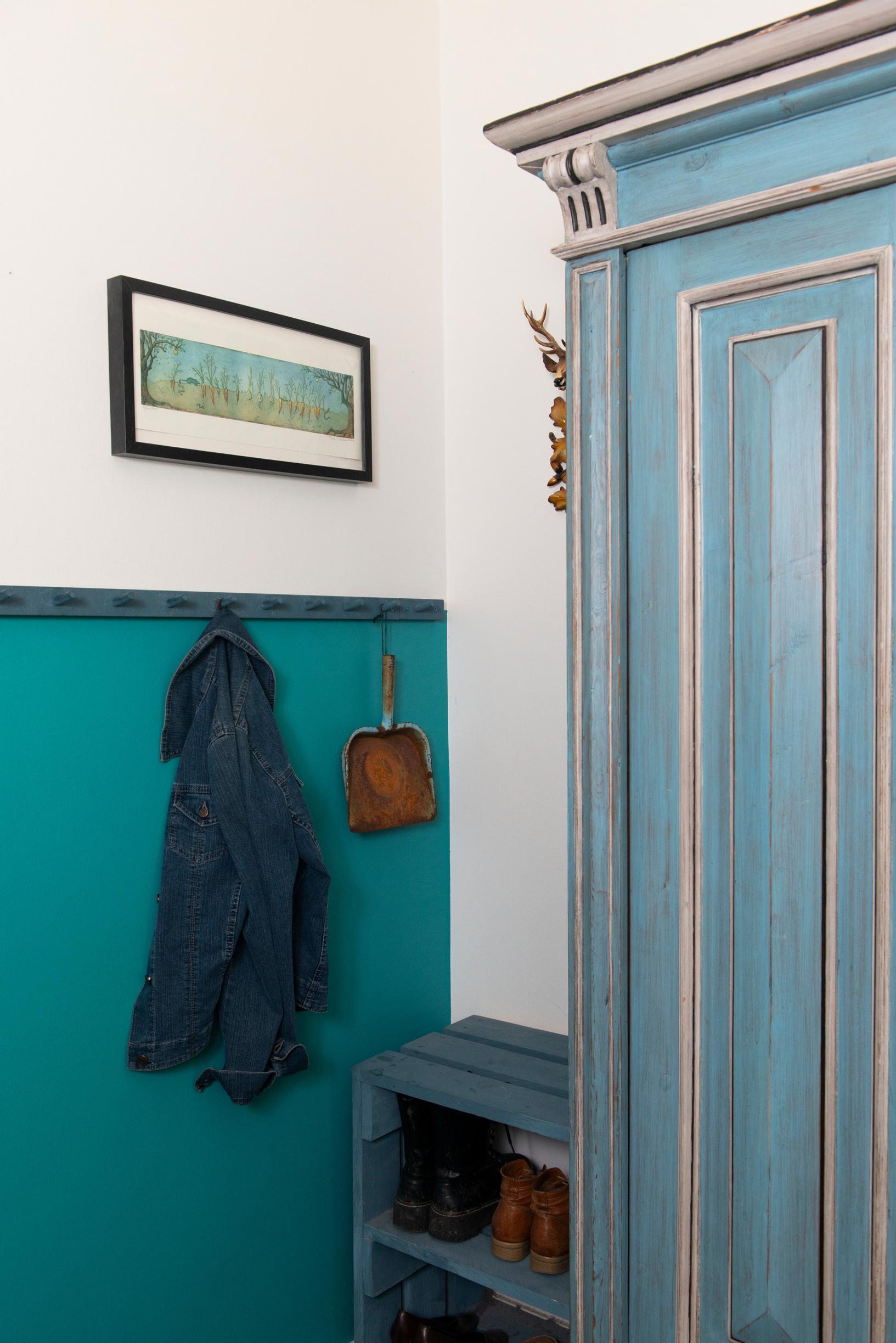 turquoise wall in the entryway