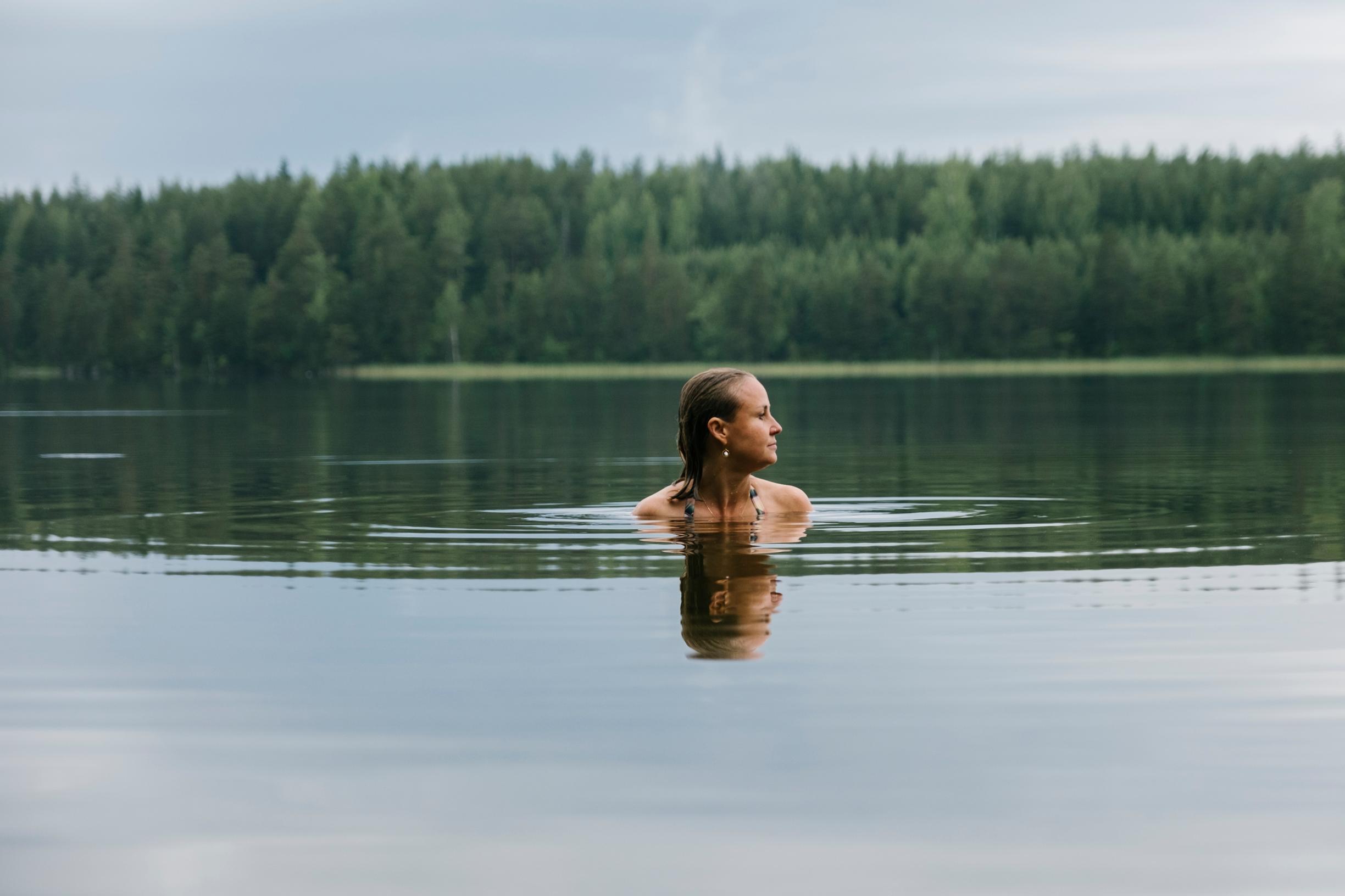 A woman swimming in a lake