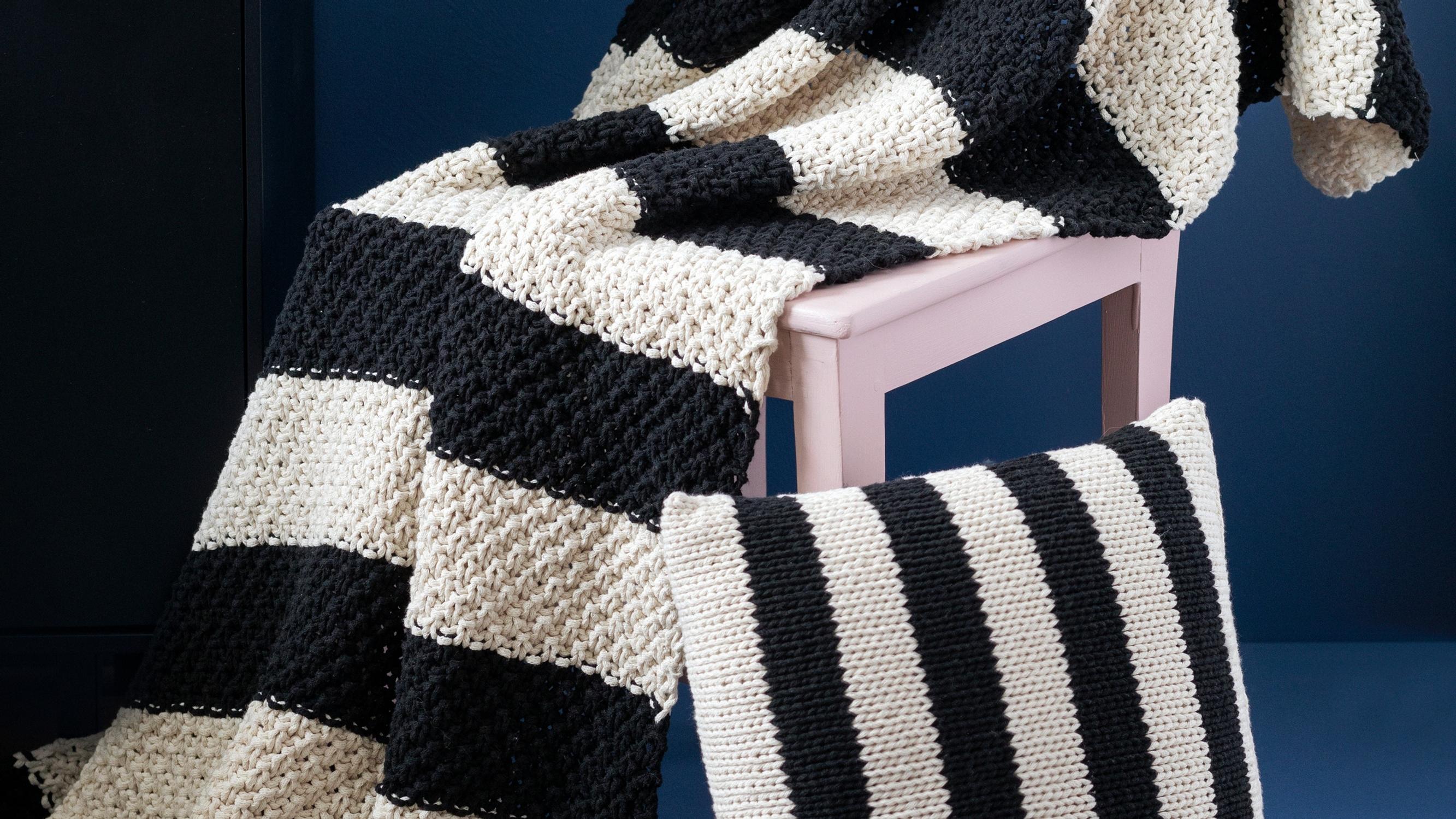 Knit a striped seaside set: Easy instructions for a charming pillow and throw