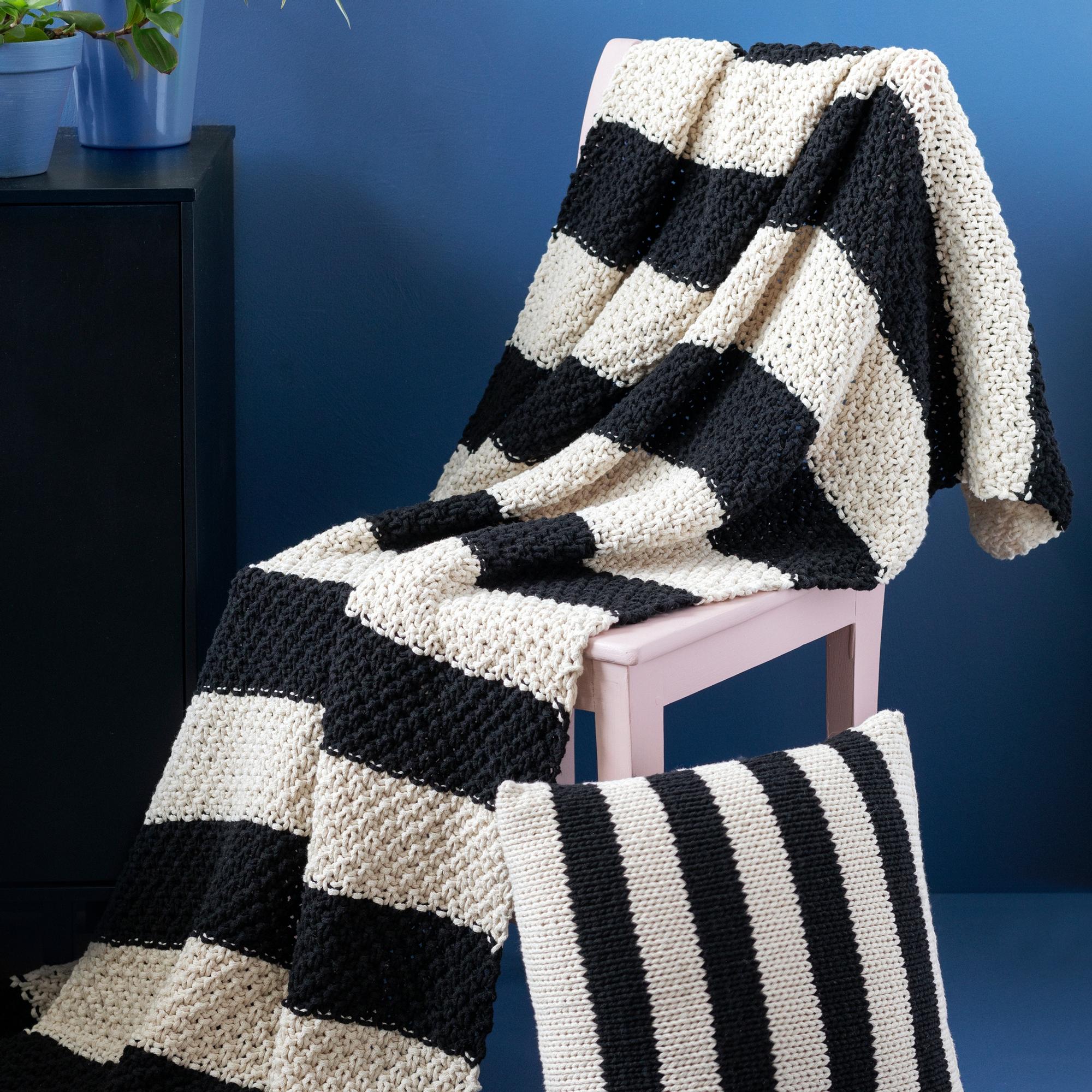Knit a striped seaside set: Easy instructions for a charming pillow and throw