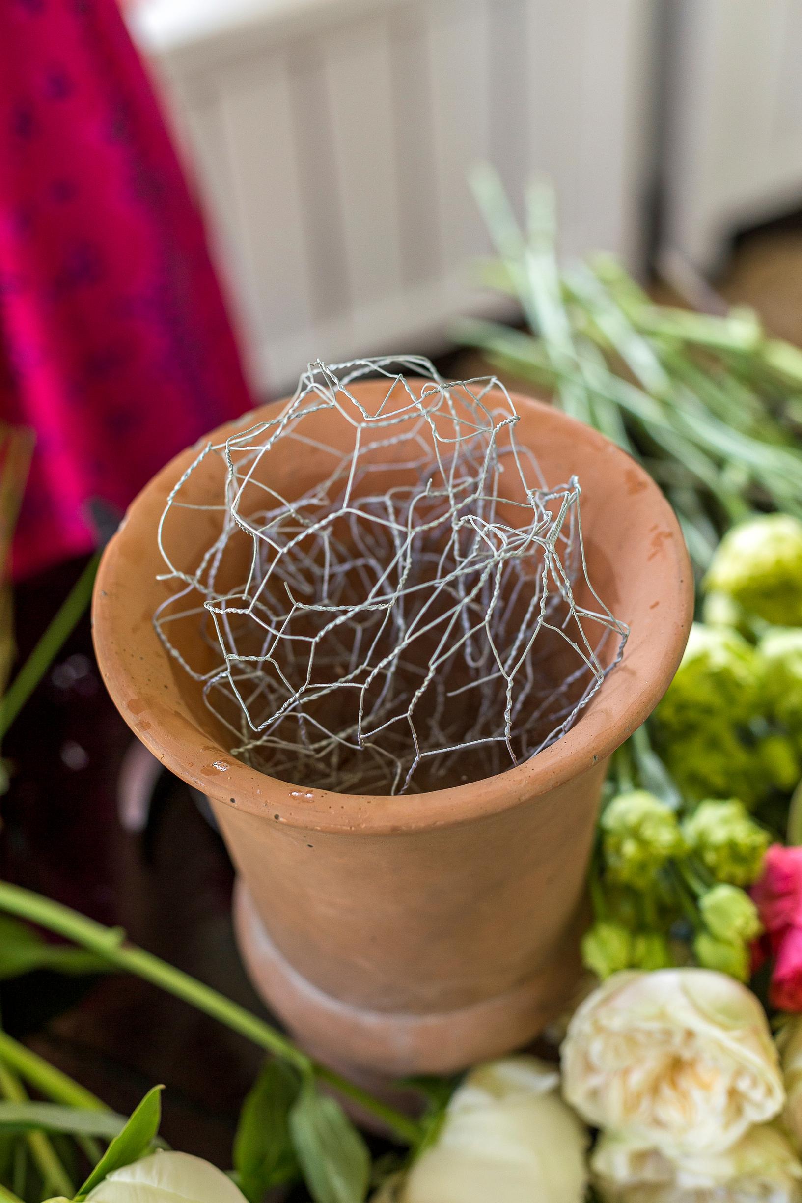 A pot with chicken wire.