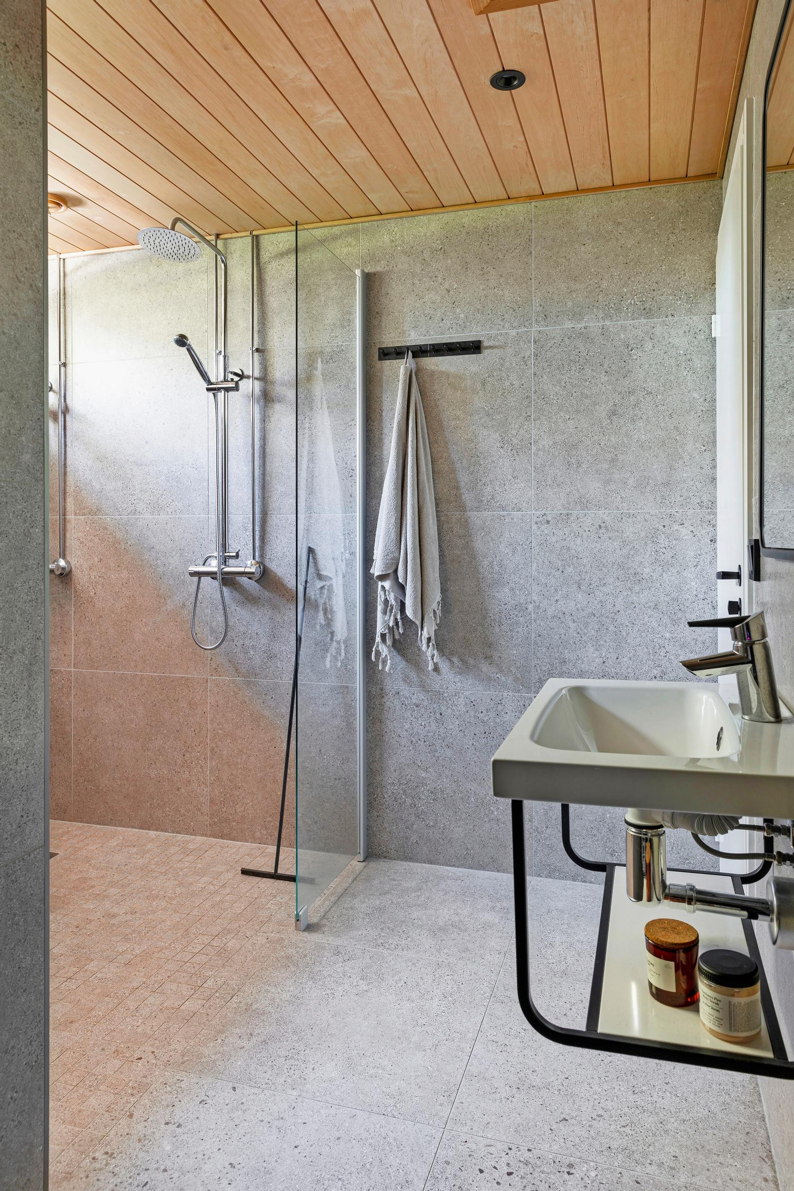 Photo of the bathroom featuring an accessible sink.