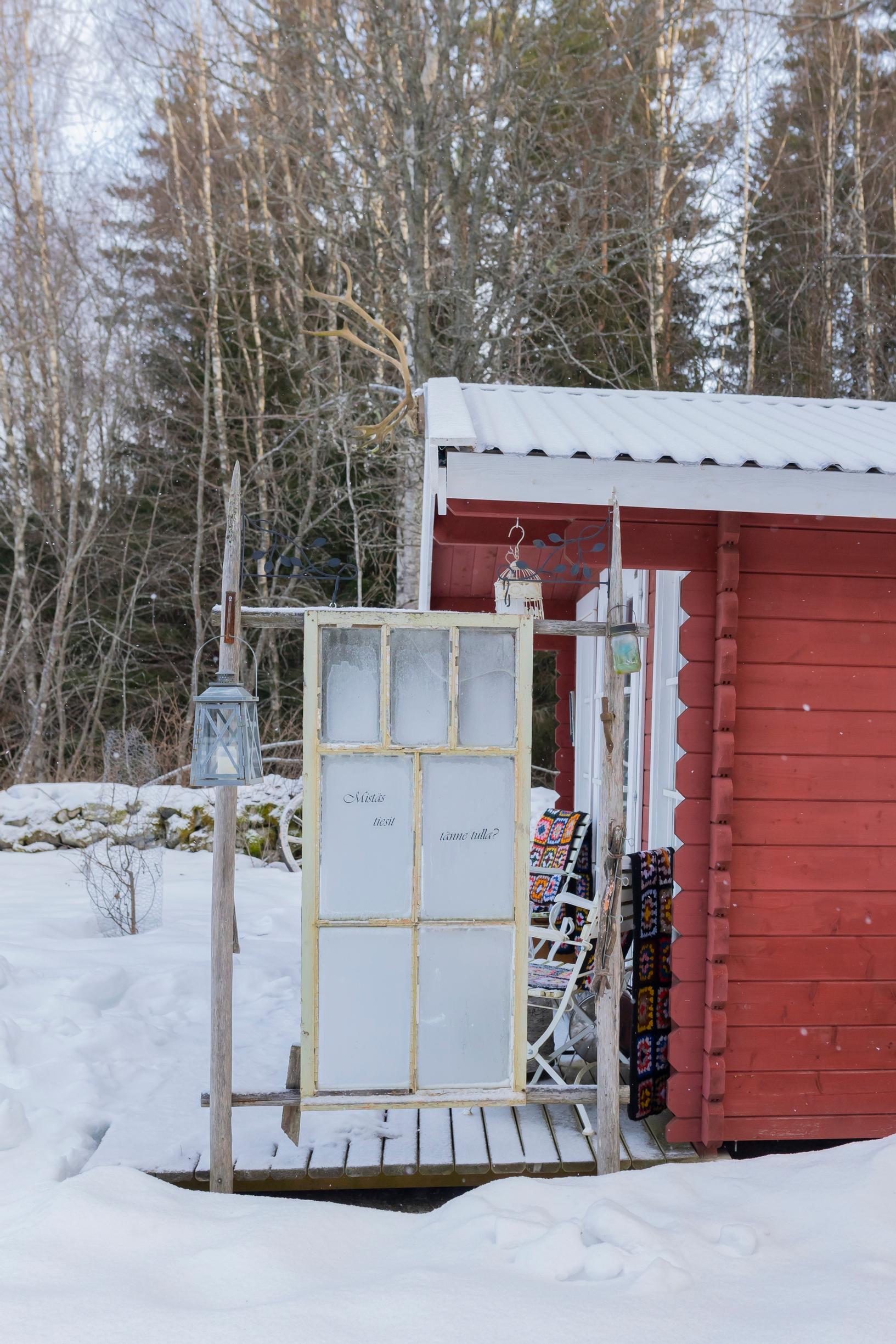 a red yard sauna in winter