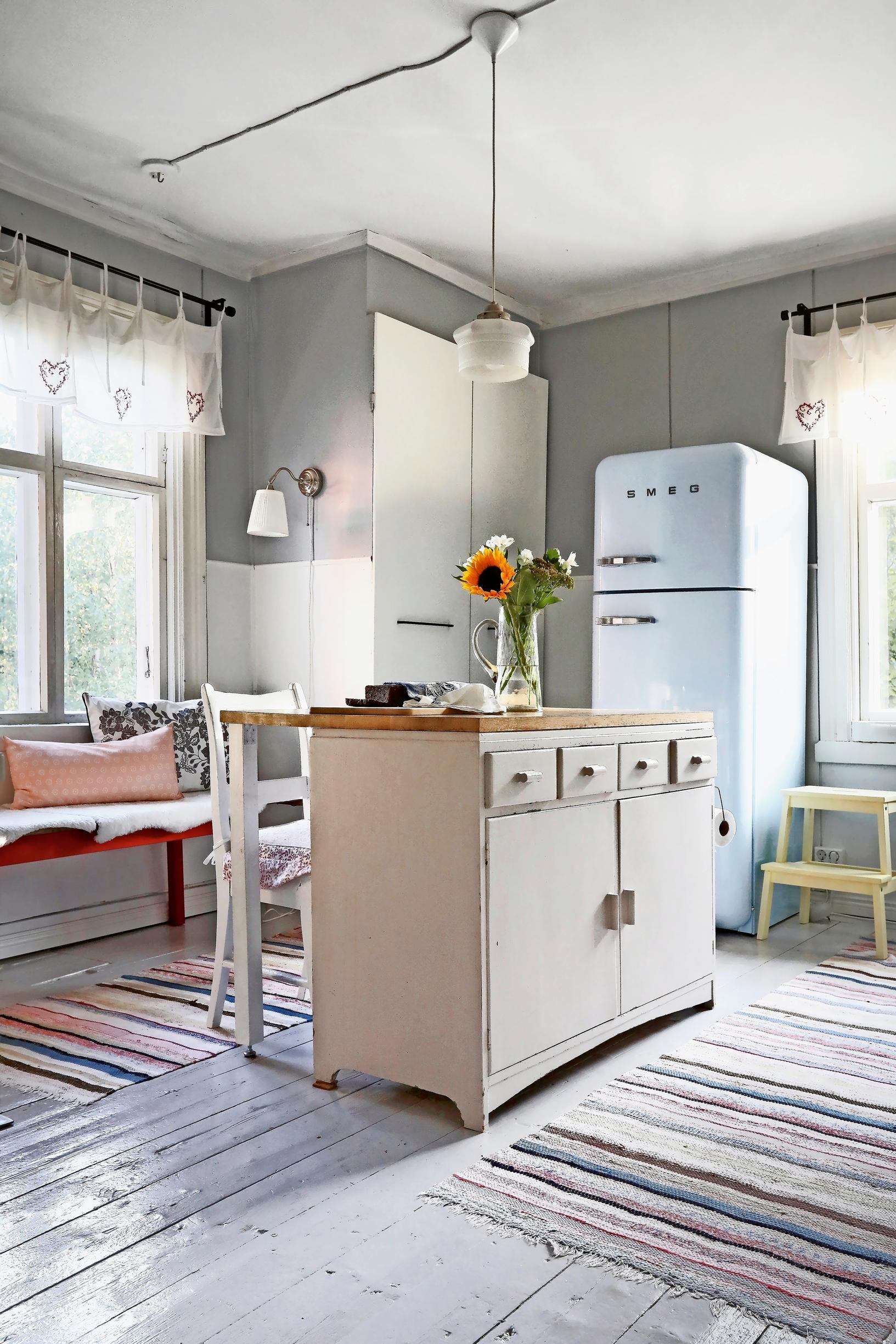 A kitchen island repurposed from a dish cabinet