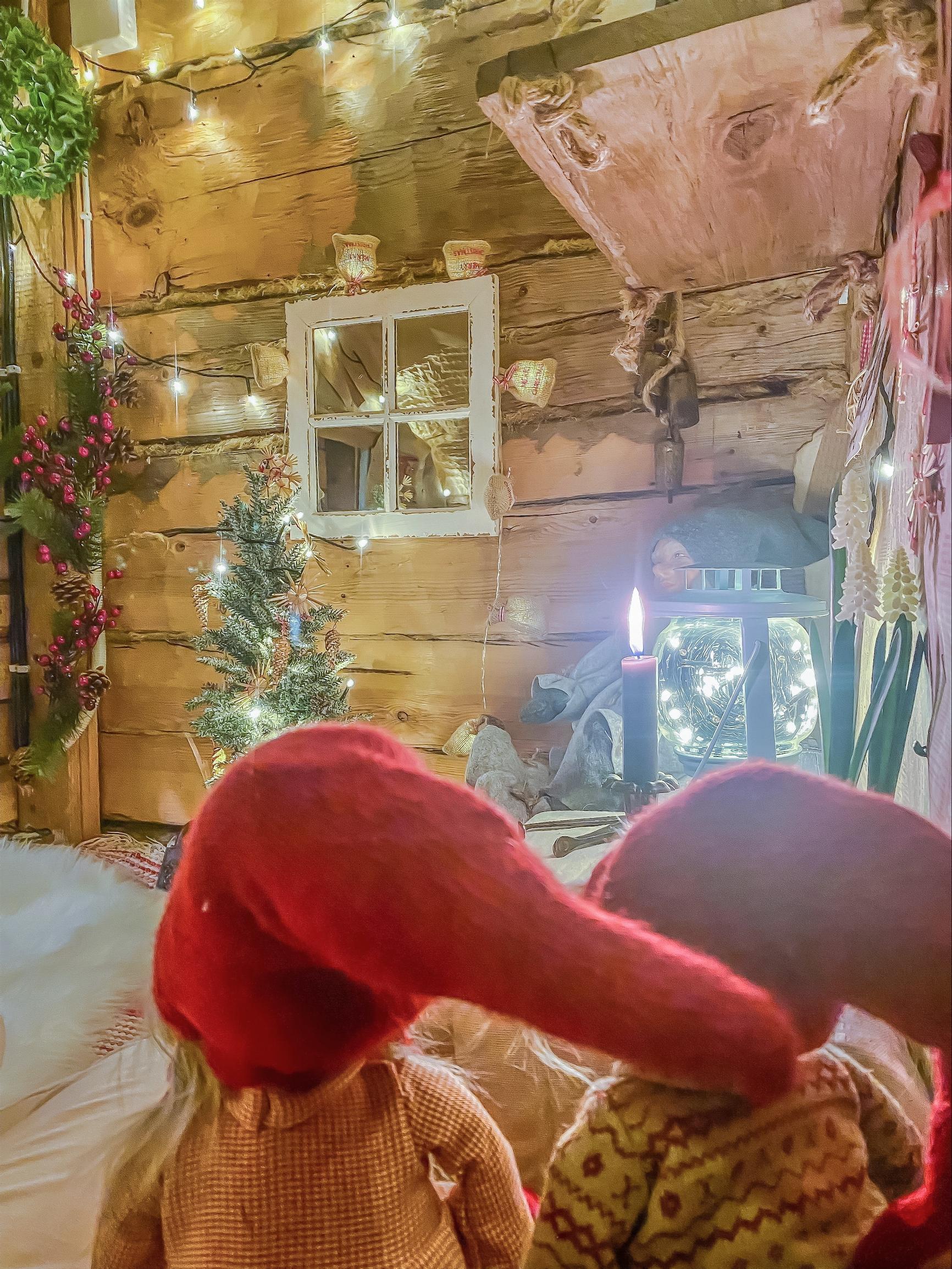 All the elves have beautiful clothes and bright red hats.