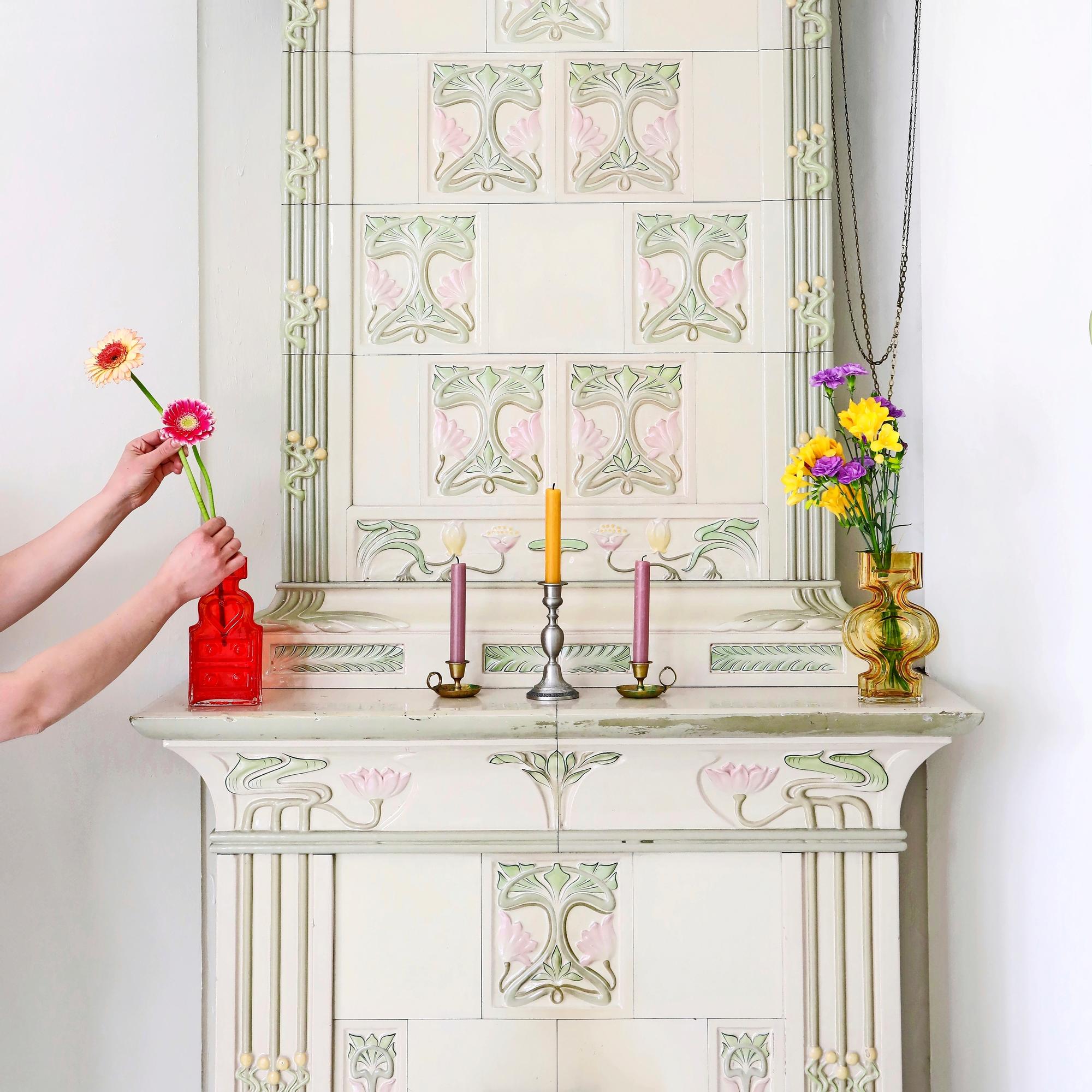 From water lilies to dragons: exploring the intricate artistry of Finland’s traditional Jugend tile stoves