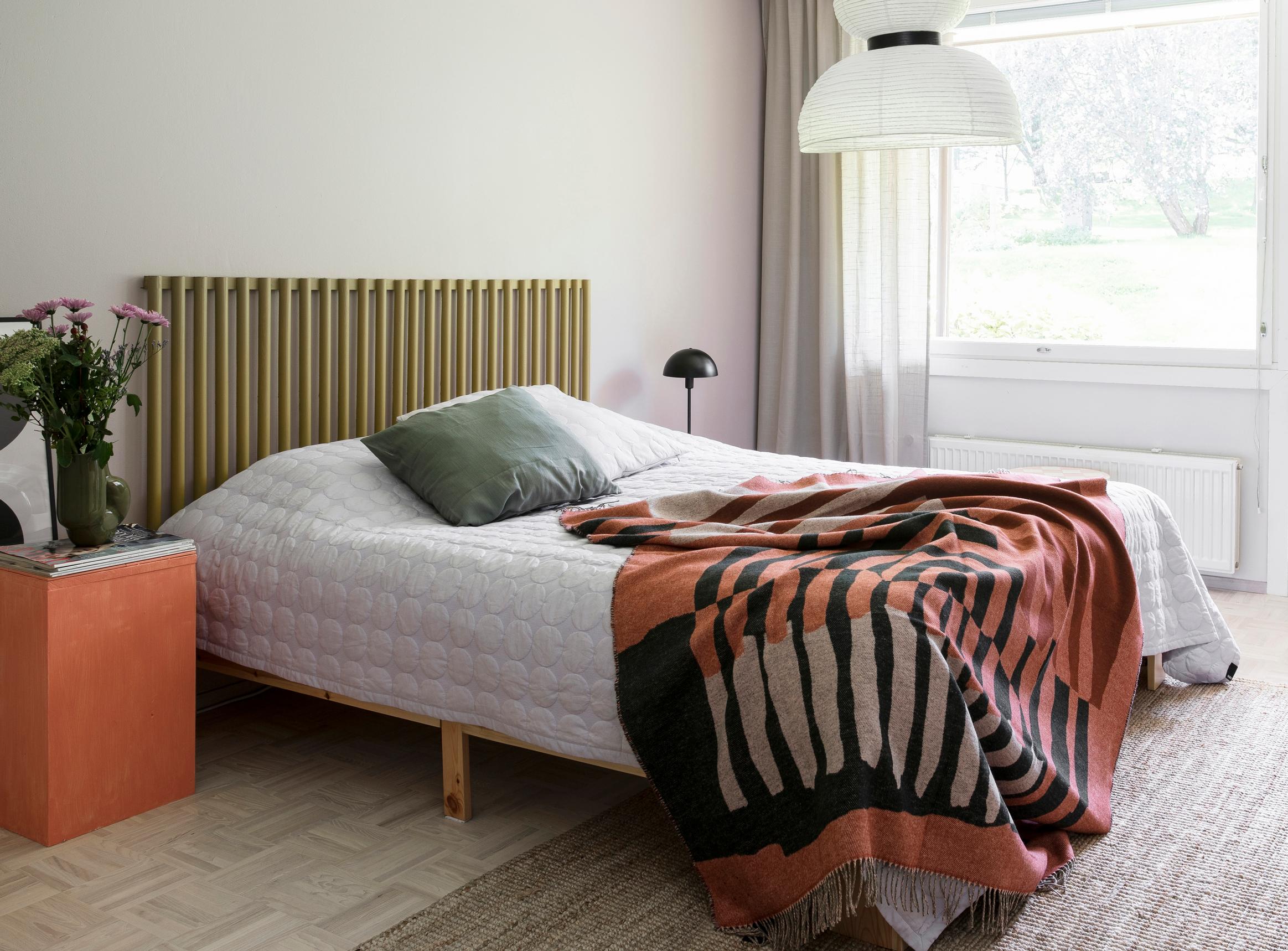 Headboard made from wooden dowels