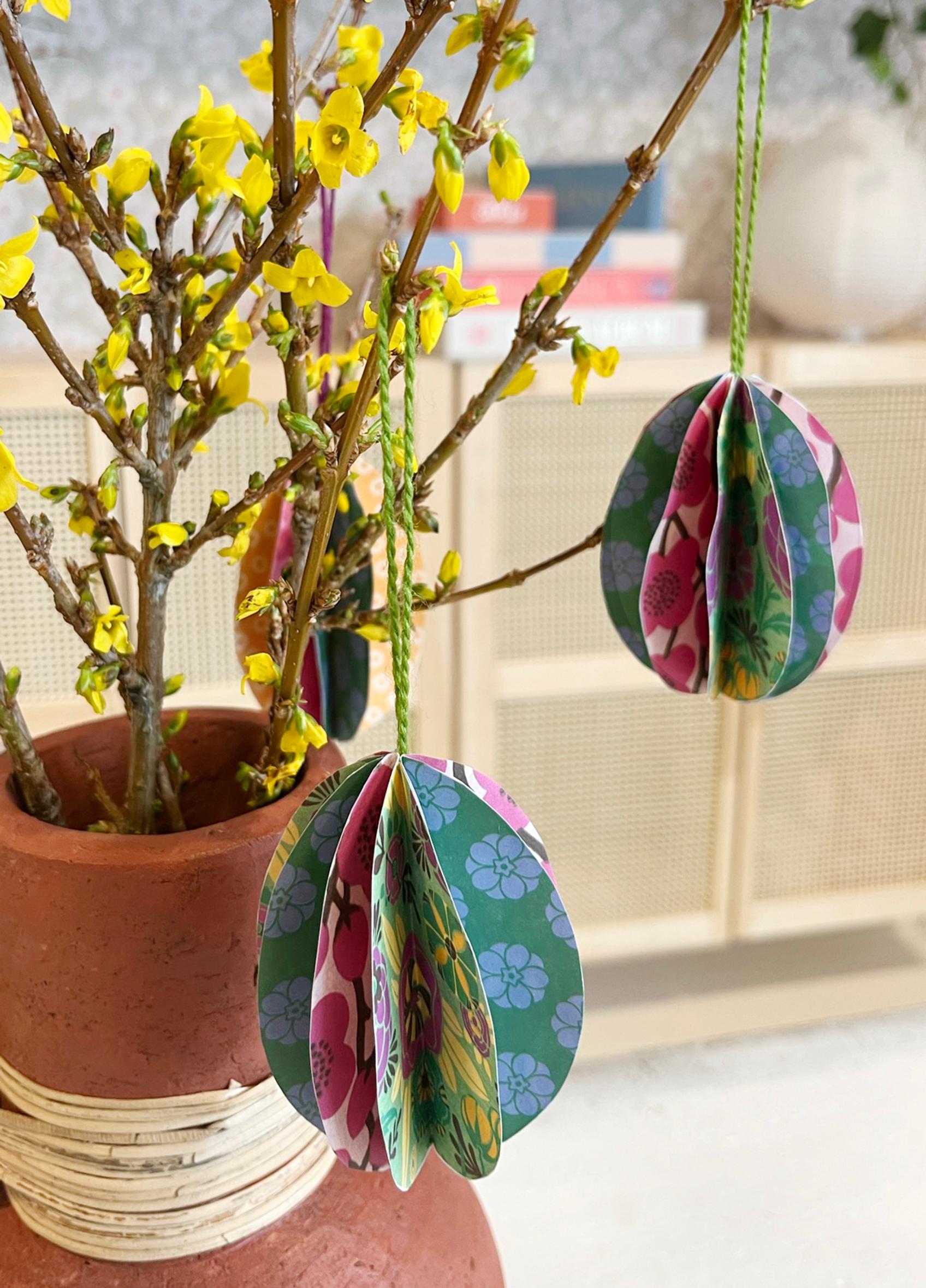 Paper Easter eggs on branches